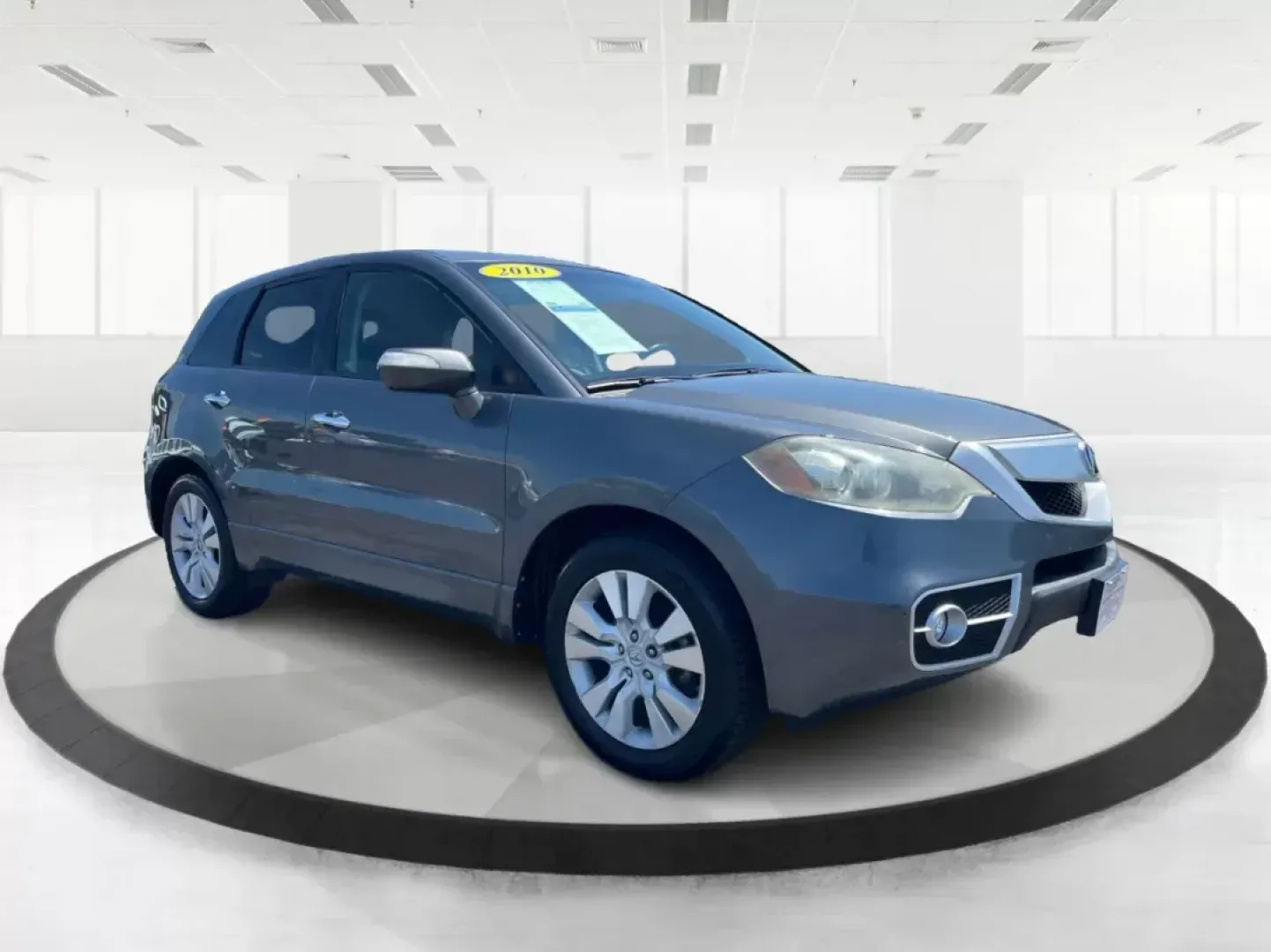 2010 Acura RDX SH-AWD w/Tech (5J8TB1H52AA) with an Other engine, located at 1099 N County Rd 25A , Troy, OH, 45373, (937) 908-9800, 40.057079, -84.212883 - Are you searching for the perfect crossover that seamlessly blends style, comfort, and versatility? Whether you're navigating daily commutes, planning family road trips, or simply seeking a reliable vehicle for weekend adventures, the 2010 Acura RDX SH-AWD w/Tech is your ideal match. With its spacio - Photo#0