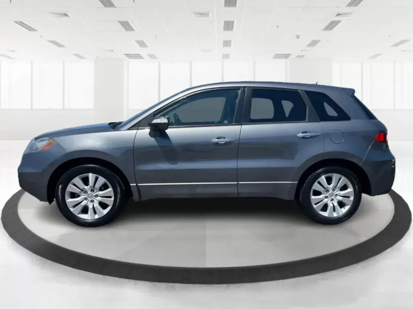 2010 Acura RDX SH-AWD w/Tech (5J8TB1H52AA) with an Other engine, located at 1099 N County Rd 25A , Troy, OH, 45373, (937) 908-9800, 40.057079, -84.212883 - Are you searching for the perfect crossover that seamlessly blends style, comfort, and versatility? Whether you're navigating daily commutes, planning family road trips, or simply seeking a reliable vehicle for weekend adventures, the 2010 Acura RDX SH-AWD w/Tech is your ideal match. With its spacio - Photo#5