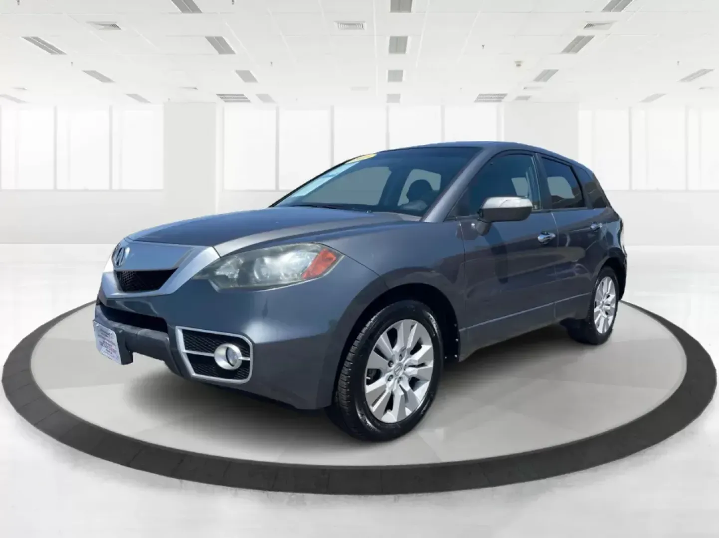 2010 Acura RDX SH-AWD w/Tech (5J8TB1H52AA) with an Other engine, located at 1099 N County Rd 25A , Troy, OH, 45373, (937) 908-9800, 40.057079, -84.212883 - Are you searching for the perfect crossover that seamlessly blends style, comfort, and versatility? Whether you're navigating daily commutes, planning family road trips, or simply seeking a reliable vehicle for weekend adventures, the 2010 Acura RDX SH-AWD w/Tech is your ideal match. With its spacio - Photo#7