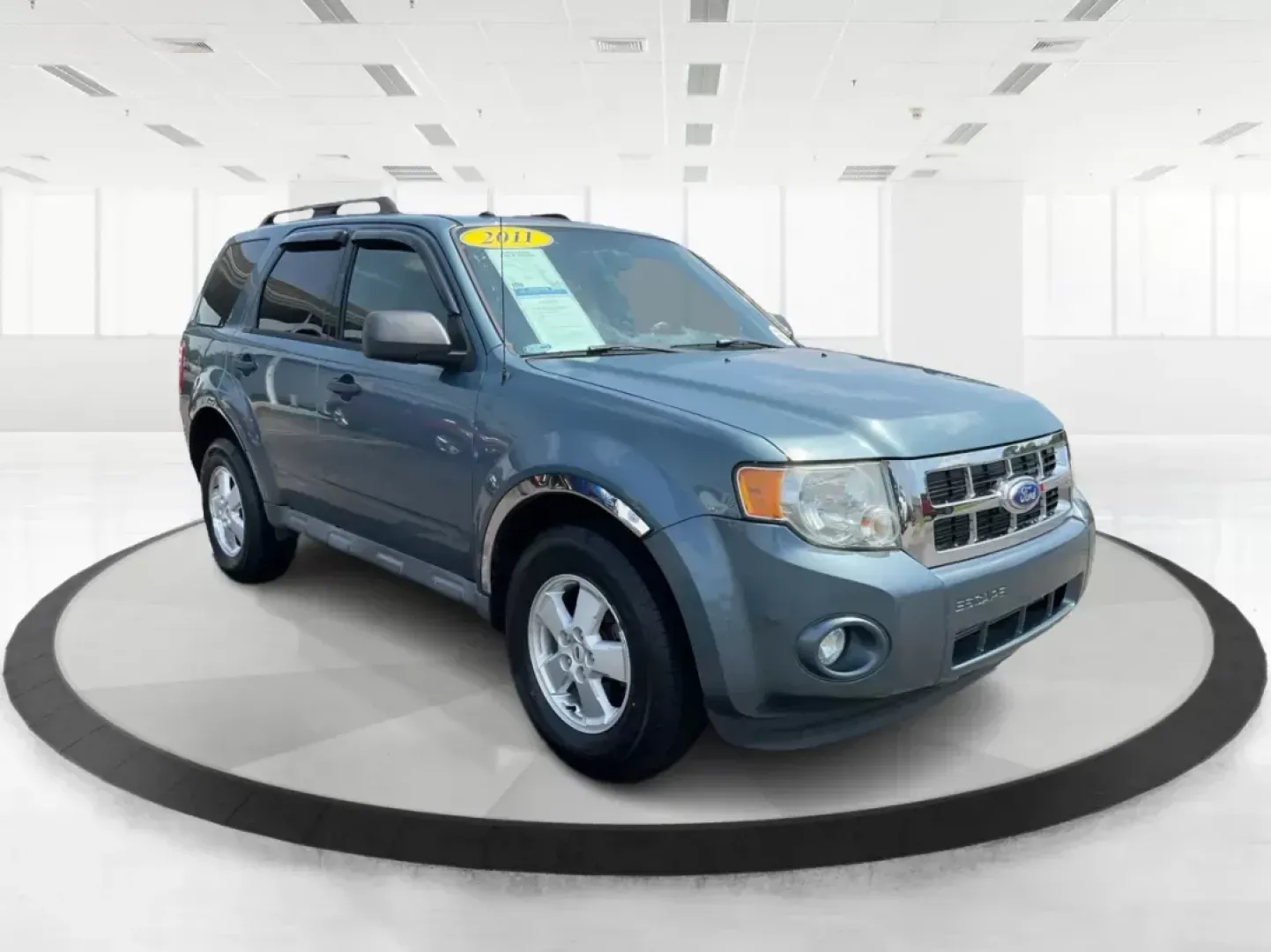 2011 Ford Escape XLT (1FMCU9DG6BK) with an Other engine, located at 401 Woodman Dr, Riverside, OH, 45431, (937) 908-9800, 39.760899, -84.123421 - **Discover Your Next Adventure with the 2011 Ford Escape XLT in Fairborn, OH!**<br /> <br /> Are you ready to elevate your lifestyle? Whether you're a growing family searching for reliable transportation, a weekend warrior looking for adventure, or a commuter seeking comfort and efficiency, the 2011 - Photo#0