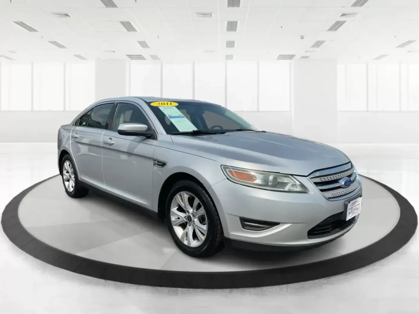 2011 Ford Taurus SEL (1FAHP2EW4BG) with an Duratec 3.5L V-6 DOHC engine, located at 401 Woodman Dr, Riverside, OH, 45431, (937) 908-9800, 39.760899, -84.123421 - 2011 Ford Taurus SEL - Photo#0
