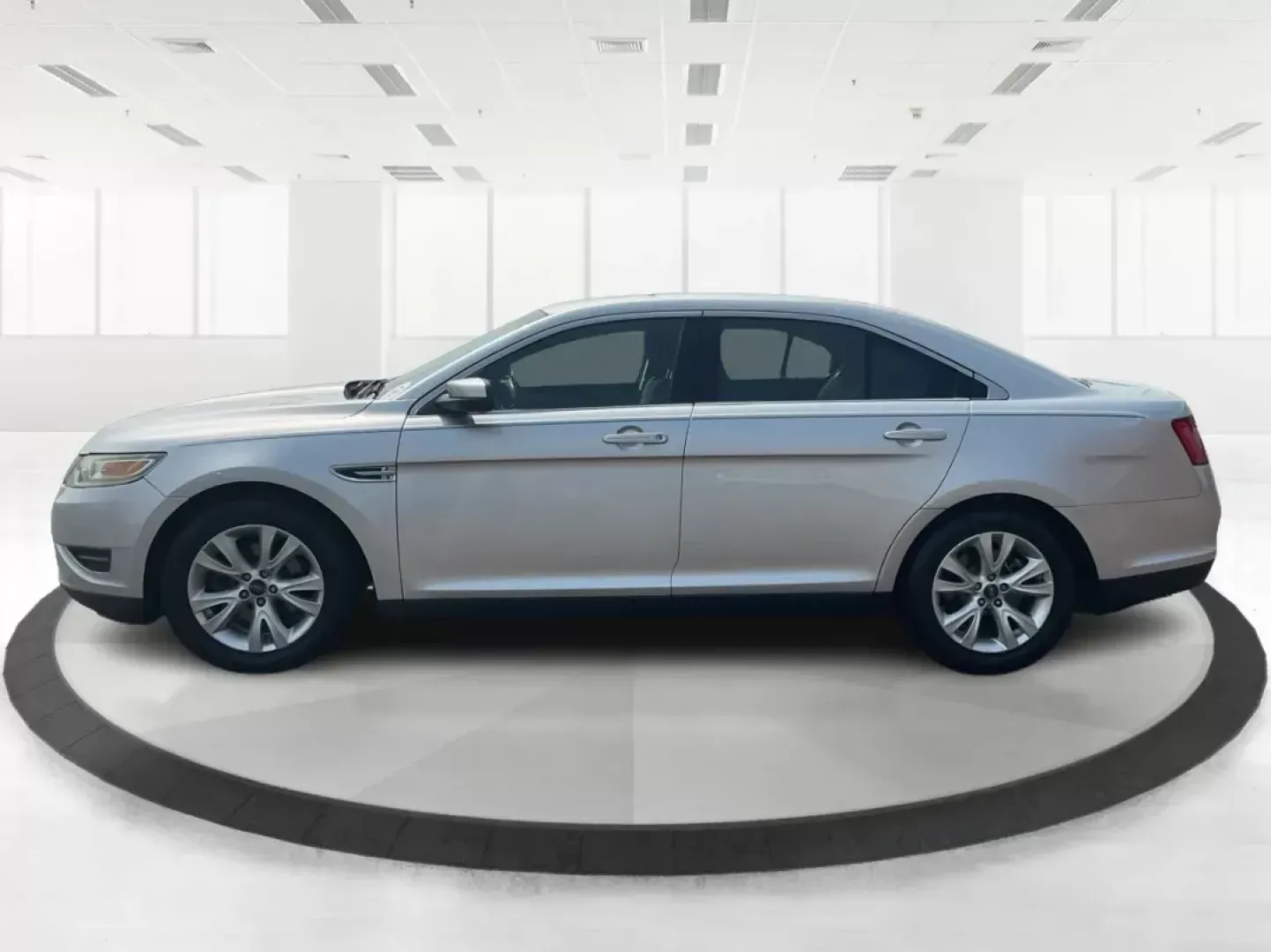 2011 Ford Taurus SEL (1FAHP2EW4BG) with an Duratec 3.5L V-6 DOHC engine, located at 401 Woodman Dr, Riverside, OH, 45431, (937) 908-9800, 39.760899, -84.123421 - 2011 Ford Taurus SEL - Photo#5