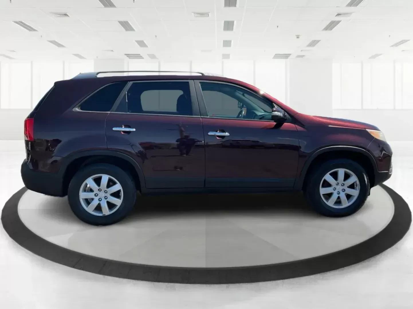 2011 Dark Cherry Kia Sorento LX 2WD (5XYKT3A14BG) with an 2.4L L4 DOHC 16V engine, 6-Speed Automatic transmission, located at 1230 East Main St, Xenia, OH, 45385, (937) 908-9800, 39.688026, -83.910172 - 2011 Kia Sorento LX 2WD - Photo#0