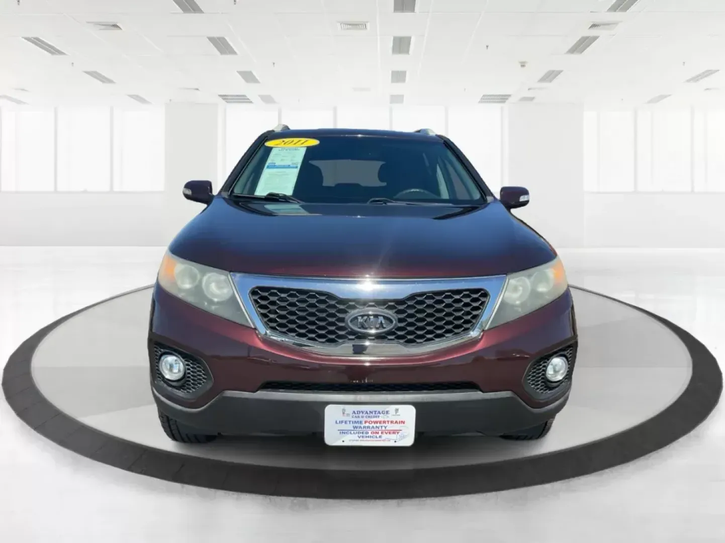 2011 Dark Cherry Kia Sorento LX 2WD (5XYKT3A14BG) with an 2.4L L4 DOHC 16V engine, 6-Speed Automatic transmission, located at 1230 East Main St, Xenia, OH, 45385, (937) 908-9800, 39.688026, -83.910172 - 2011 Kia Sorento LX 2WD - Photo#6