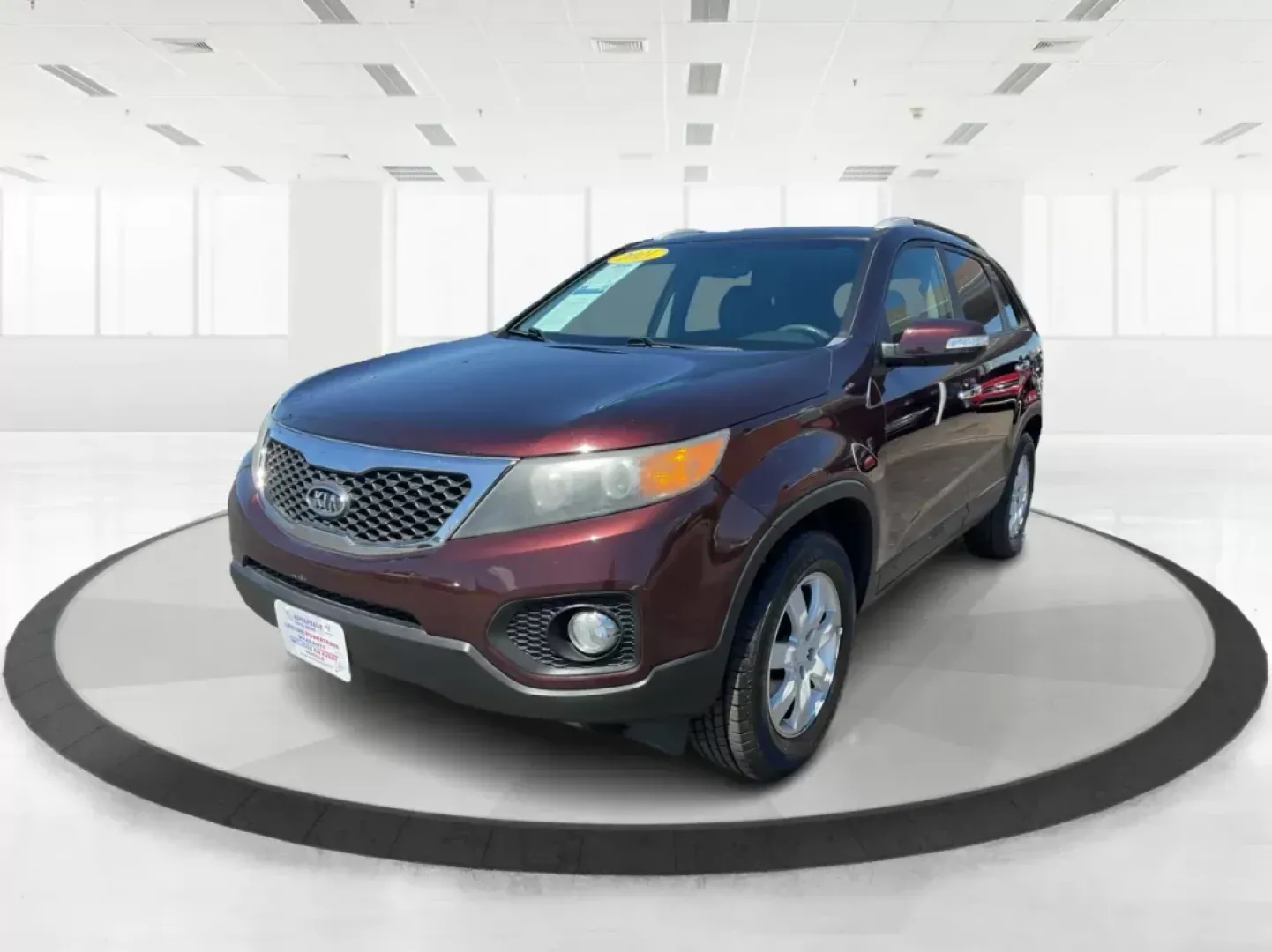 2011 Dark Cherry Kia Sorento LX 2WD (5XYKT3A14BG) with an 2.4L L4 DOHC 16V engine, 6-Speed Automatic transmission, located at 1230 East Main St, Xenia, OH, 45385, (937) 908-9800, 39.688026, -83.910172 - 2011 Kia Sorento LX 2WD - Photo#7