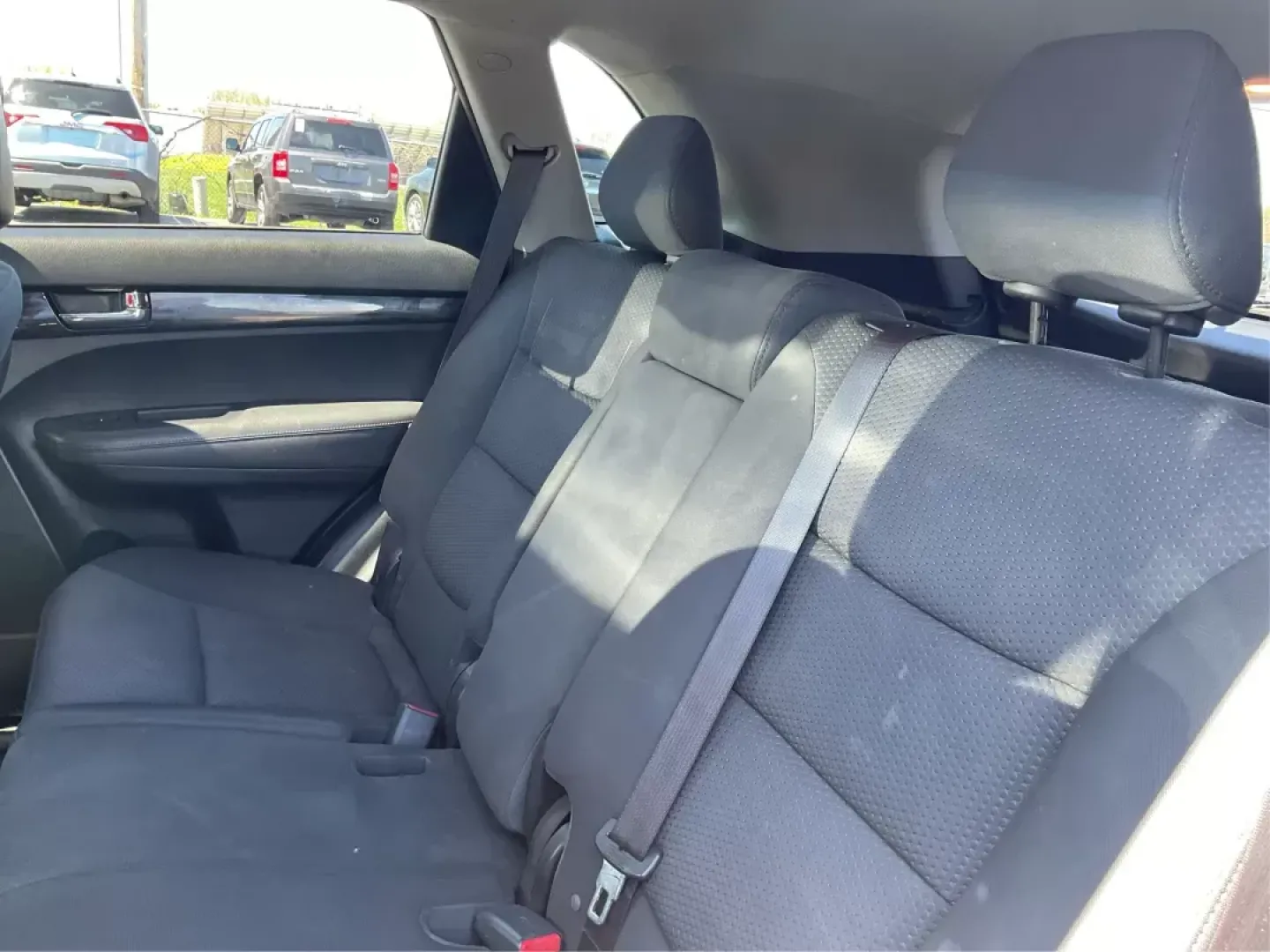 2011 Dark Cherry Kia Sorento LX 2WD (5XYKT3A14BG) with an 2.4L L4 DOHC 16V engine, 6-Speed Automatic transmission, located at 1230 East Main St, Xenia, OH, 45385, (937) 908-9800, 39.688026, -83.910172 - 2011 Kia Sorento LX 2WD - Photo#8