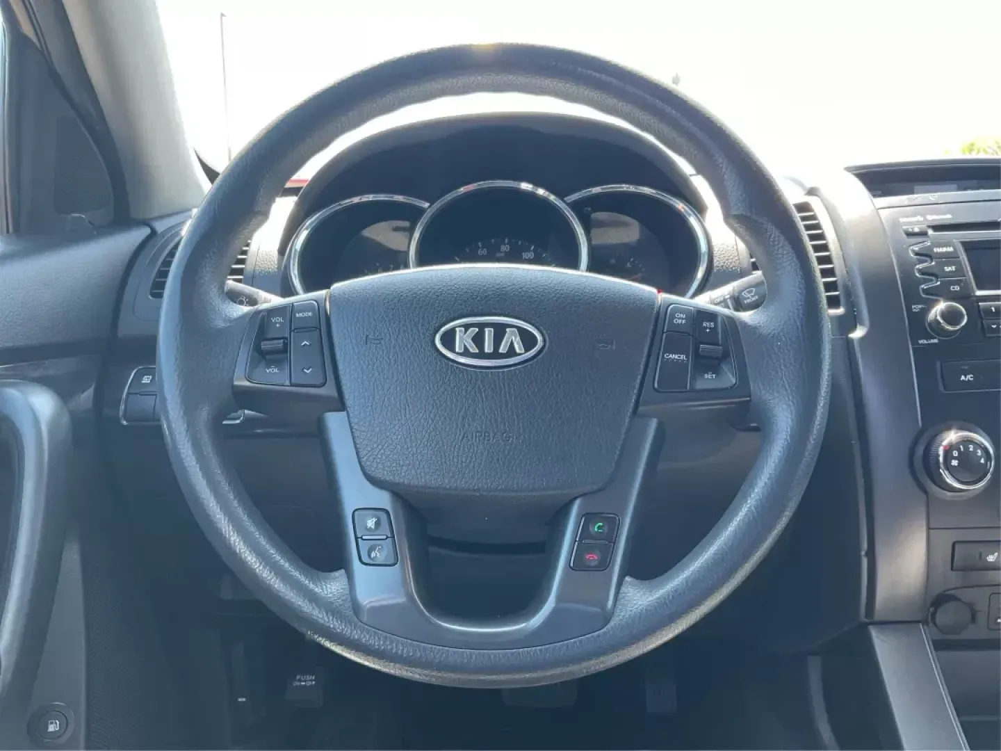 2011 Dark Cherry Kia Sorento LX 2WD (5XYKT3A14BG) with an 2.4L L4 DOHC 16V engine, 6-Speed Automatic transmission, located at 1230 East Main St, Xenia, OH, 45385, (937) 908-9800, 39.688026, -83.910172 - 2011 Kia Sorento LX 2WD - Photo#13