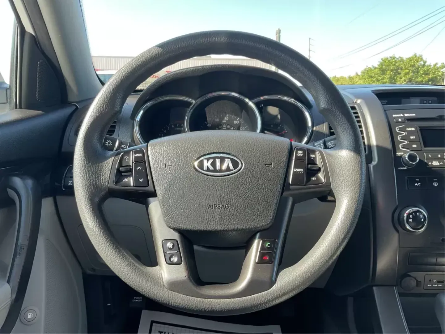 2011 Kia Sorento LX (5XYKTCA11BG) with an 2.4L I-4 DOHC engine, located at 8750 N County Rd 25A, Piqua, OH, 45356, (937) 908-9800, 40.164391, -84.232513 - 2011 Kia Sorento LX - Photo#14