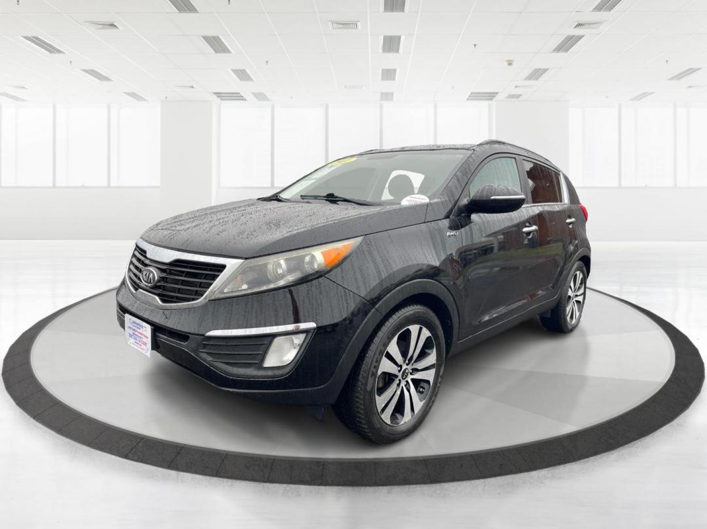 2011 Kia Sportage EX AWD (KNDPCCA29B7) with an 2.4L V6 DOHC 24V engine, 6-Speed Automatic transmission, located at 1184 Kauffman Ave, Fairborn, OH, 45324, (937) 908-9800, 39.807072, -84.030914 - 2011 Kia Sportage EX AWD - Photo#7