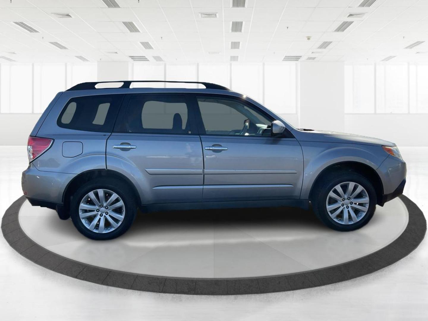 2011 Subaru Forester 2.5X Limited (JF2SHAFC9BH) with an 2.5L H-4 DOHC engine, located at 1951 S Dayton Lakeview Rd., New Carlisle, OH, 45344, (937) 908-9800, 39.890999, -84.050255 - 2011 Subaru Forester 2.5X Limited - Photo#1
