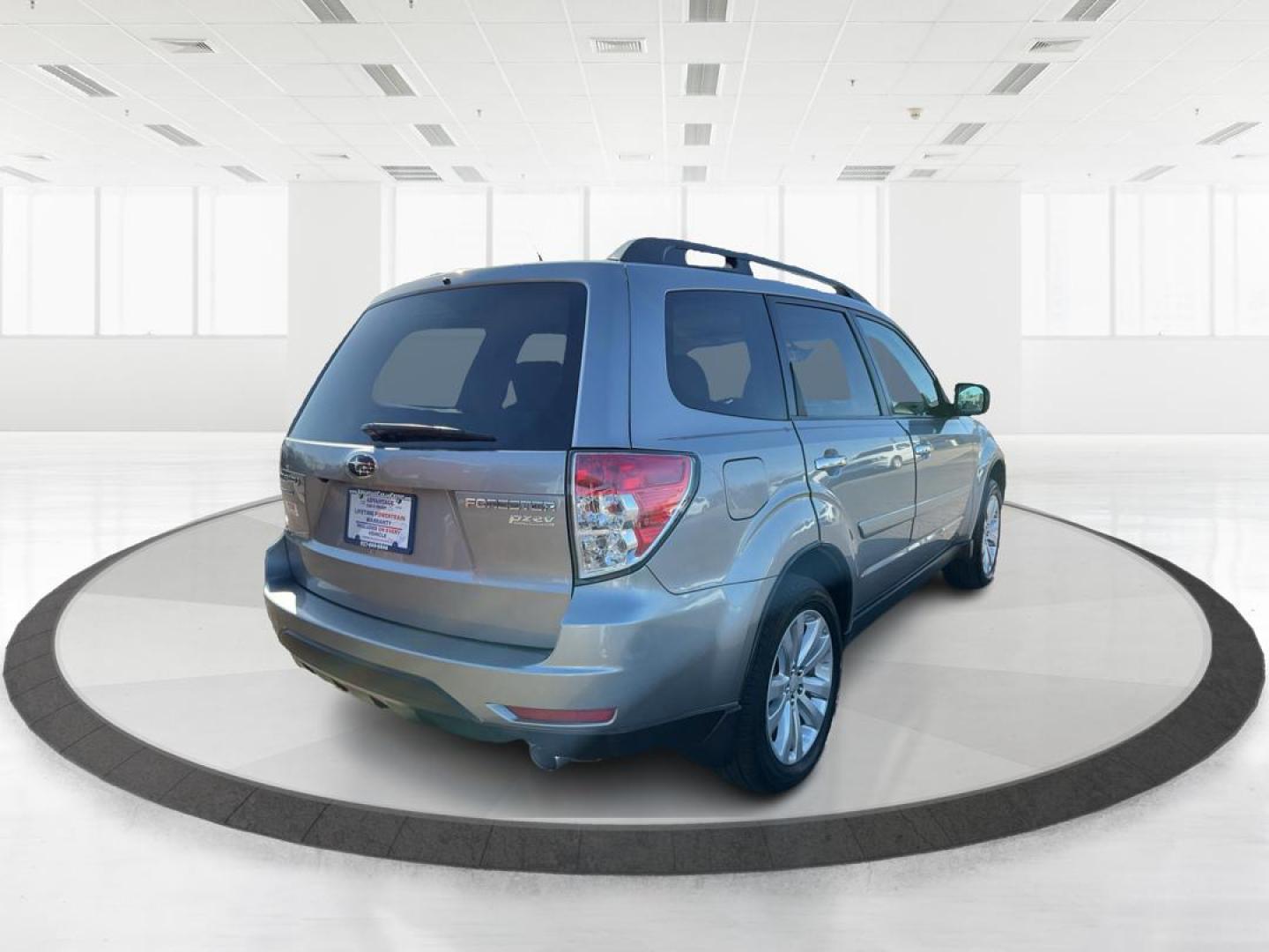 2011 Subaru Forester 2.5X Limited (JF2SHAFC9BH) with an 2.5L H-4 DOHC engine, located at 1951 S Dayton Lakeview Rd., New Carlisle, OH, 45344, (937) 908-9800, 39.890999, -84.050255 - 2011 Subaru Forester 2.5X Limited - Photo#2