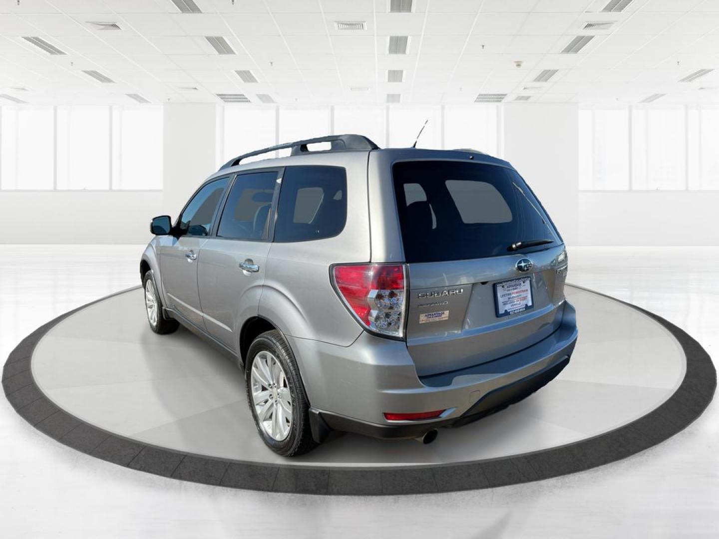 2011 Subaru Forester 2.5X Limited (JF2SHAFC9BH) with an 2.5L H-4 DOHC engine, located at 1951 S Dayton Lakeview Rd., New Carlisle, OH, 45344, (937) 908-9800, 39.890999, -84.050255 - 2011 Subaru Forester 2.5X Limited - Photo#4