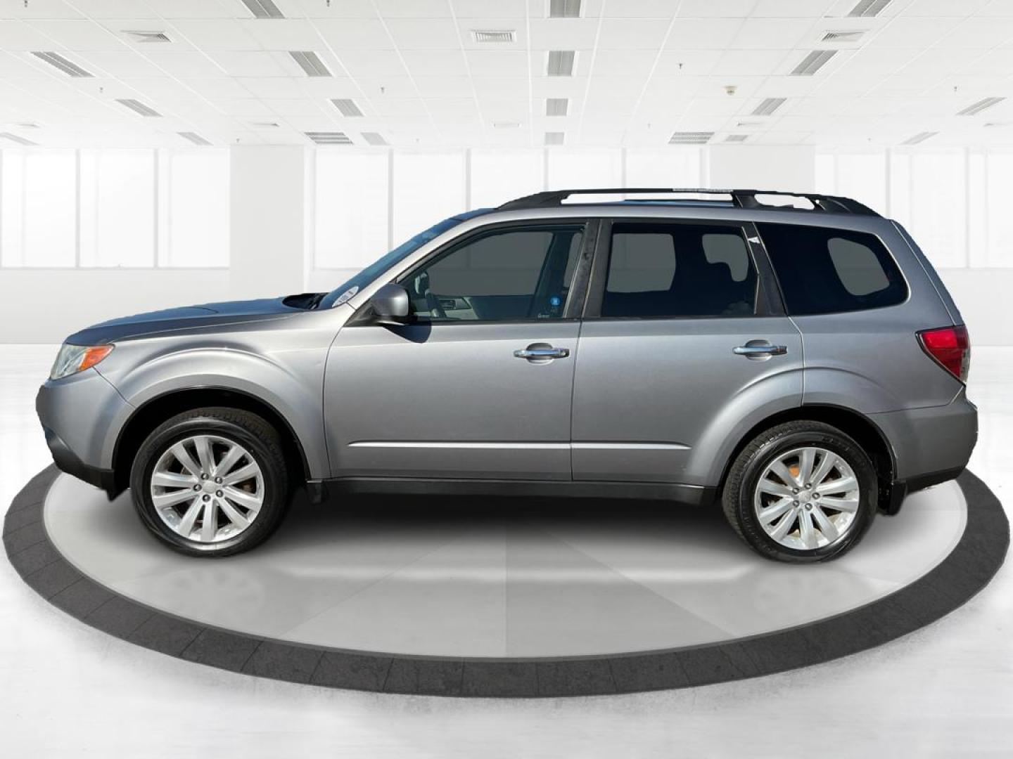 2011 Subaru Forester 2.5X Limited (JF2SHAFC9BH) with an 2.5L H-4 DOHC engine, located at 1951 S Dayton Lakeview Rd., New Carlisle, OH, 45344, (937) 908-9800, 39.890999, -84.050255 - 2011 Subaru Forester 2.5X Limited - Photo#5