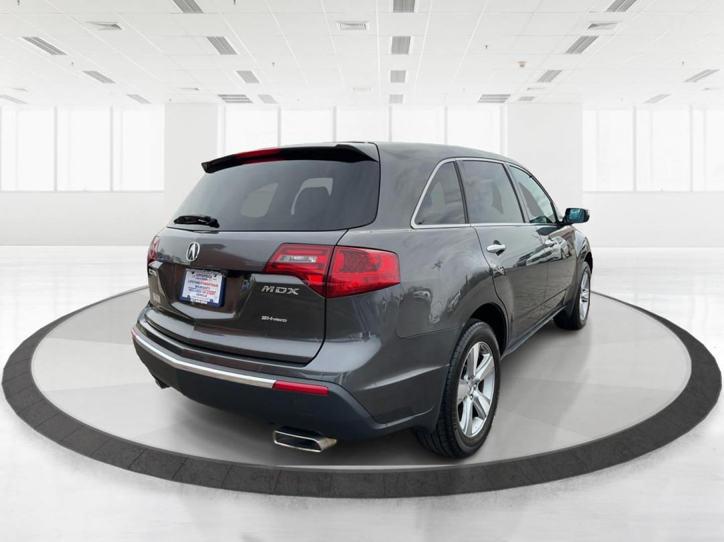 2012 Acura MDX Technology Package (2HNYD2H34CH) with an 3.7L V-6 VTEC variable valve control engine, located at 8750 N County Rd 25A, Piqua, OH, 45356, (937) 908-9800, 40.164391, -84.232513 - Third Row - Photo#2