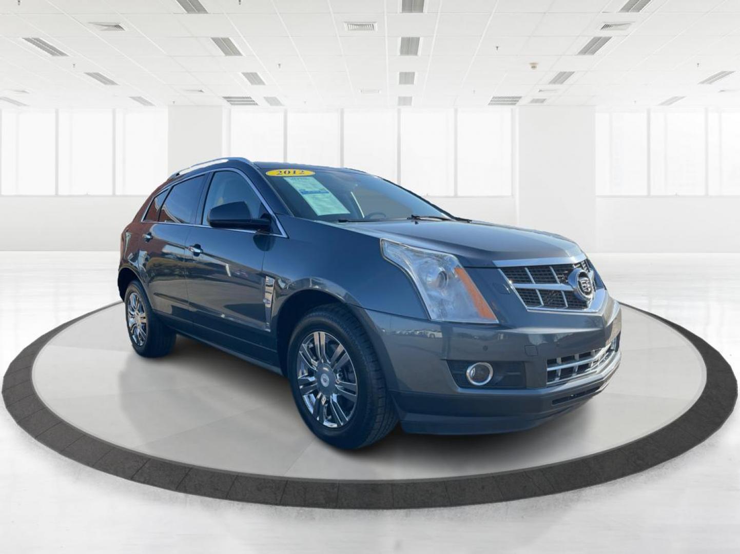 2012 Cadillac SRX Performance Collection (3GYFNEE36CS) with an 3.6L V-6 gasoline direct injection engine, located at 8750 N County Rd 25A, Piqua, OH, 45356, (937) 908-9800, 40.164391, -84.232513 - 2012 Cadillac SRX Performance Collection - Photo#0