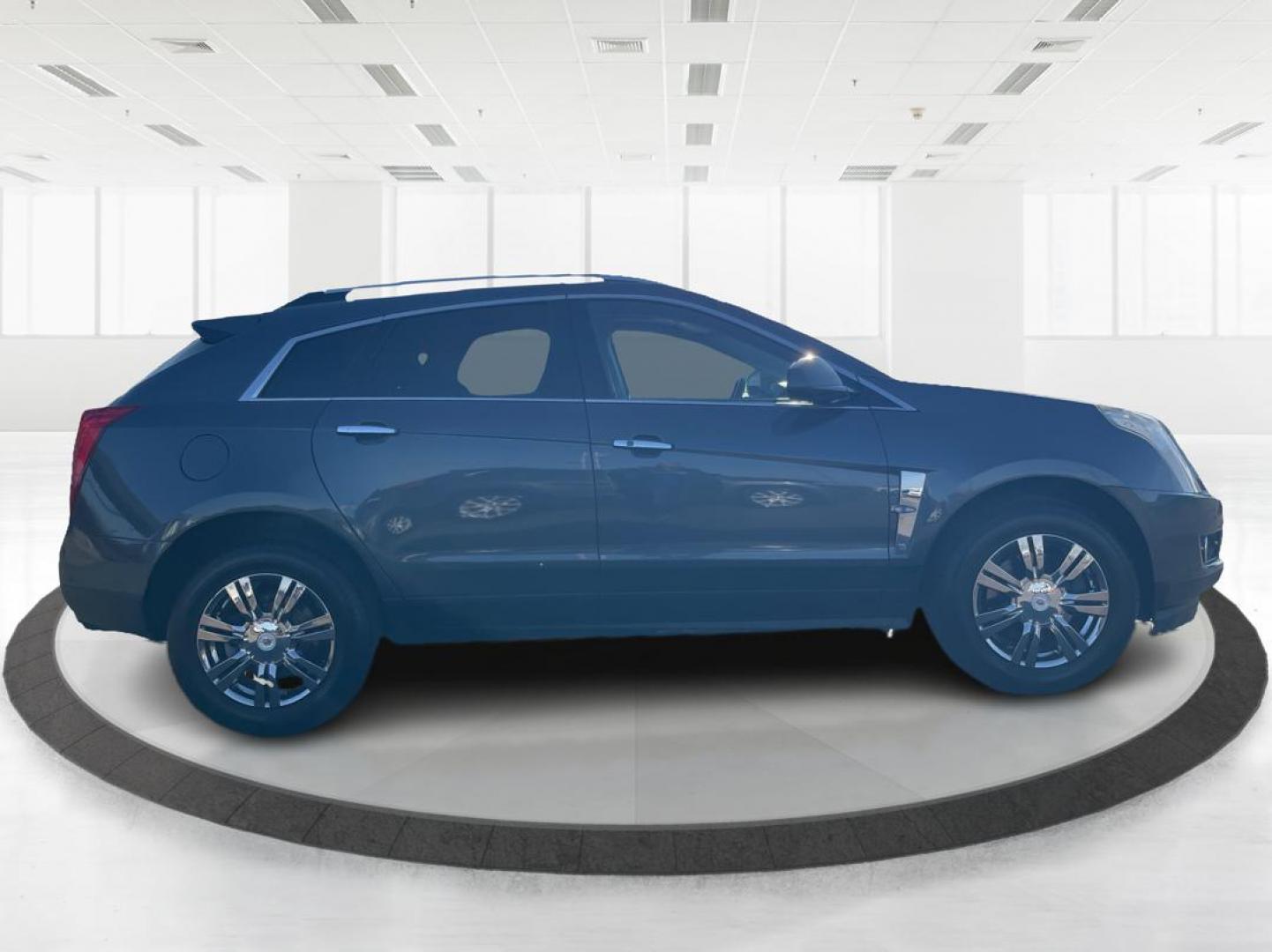 2012 Cadillac SRX Performance Collection (3GYFNEE36CS) with an 3.6L V-6 gasoline direct injection engine, located at 8750 N County Rd 25A, Piqua, OH, 45356, (937) 908-9800, 40.164391, -84.232513 - 2012 Cadillac SRX Performance Collection - Photo#1