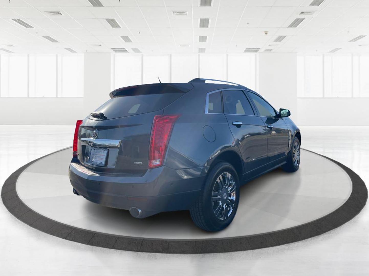 2012 Cadillac SRX Performance Collection (3GYFNEE36CS) with an 3.6L V-6 gasoline direct injection engine, located at 8750 N County Rd 25A, Piqua, OH, 45356, (937) 908-9800, 40.164391, -84.232513 - 2012 Cadillac SRX Performance Collection - Photo#2
