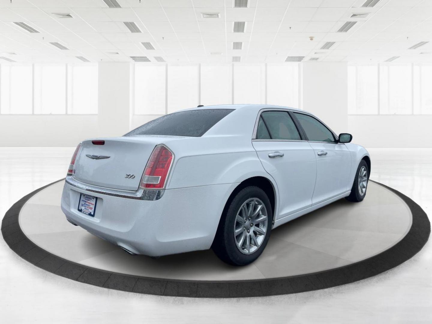 2012 Chrysler 300 Limited (2C3CCACG7CH) with an 3.6L V-6 DOHC engine, located at 8750 N County Rd 25A, Piqua, OH, 45356, (937) 908-9800, 40.164391, -84.232513 - 2012 Chrysler 300 Limited - Photo#2