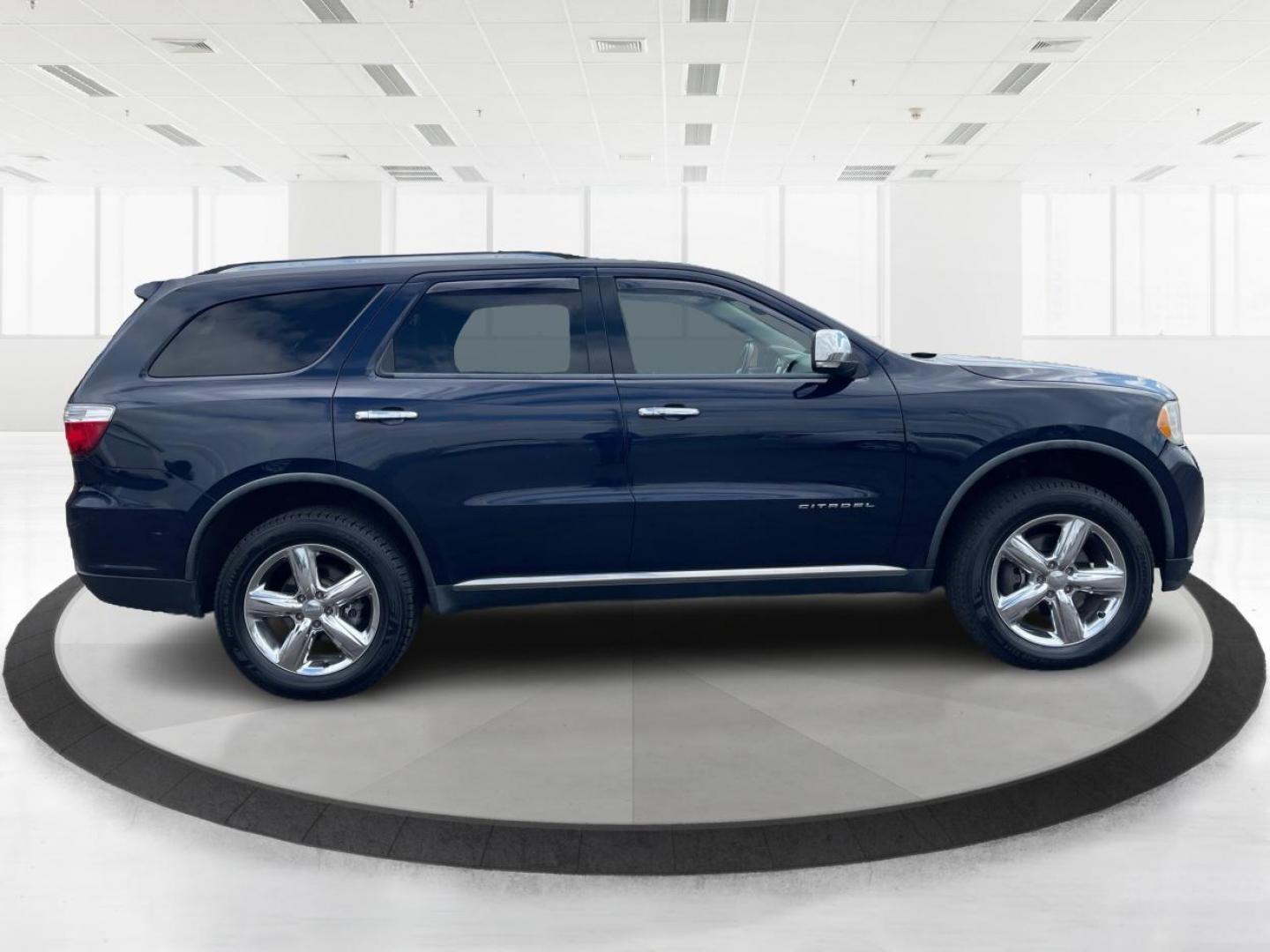 2012 Dodge Durango Citadel (1C4SDJET9CC) with an 3.6L V-6 DOHC engine, located at 8750 N County Rd 25A, Piqua, OH, 45356, (937) 908-9800, 40.164391, -84.232513 - Third Row - Photo#1