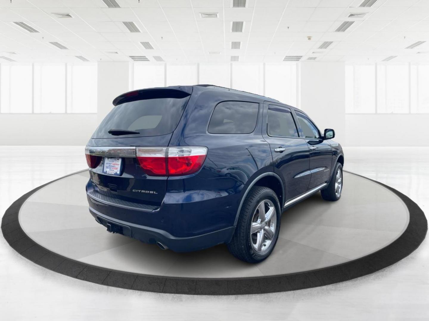 2012 Dodge Durango Citadel (1C4SDJET9CC) with an 3.6L V-6 DOHC engine, located at 8750 N County Rd 25A, Piqua, OH, 45356, (937) 908-9800, 40.164391, -84.232513 - Third Row - Photo#2