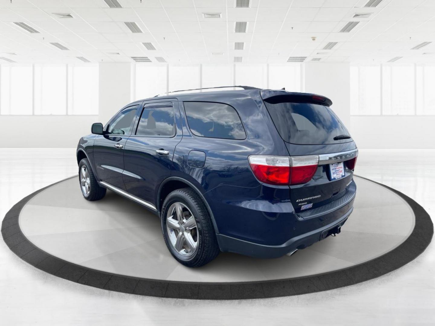 2012 Dodge Durango Citadel (1C4SDJET9CC) with an 3.6L V-6 DOHC engine, located at 8750 N County Rd 25A, Piqua, OH, 45356, (937) 908-9800, 40.164391, -84.232513 - Third Row - Photo#4