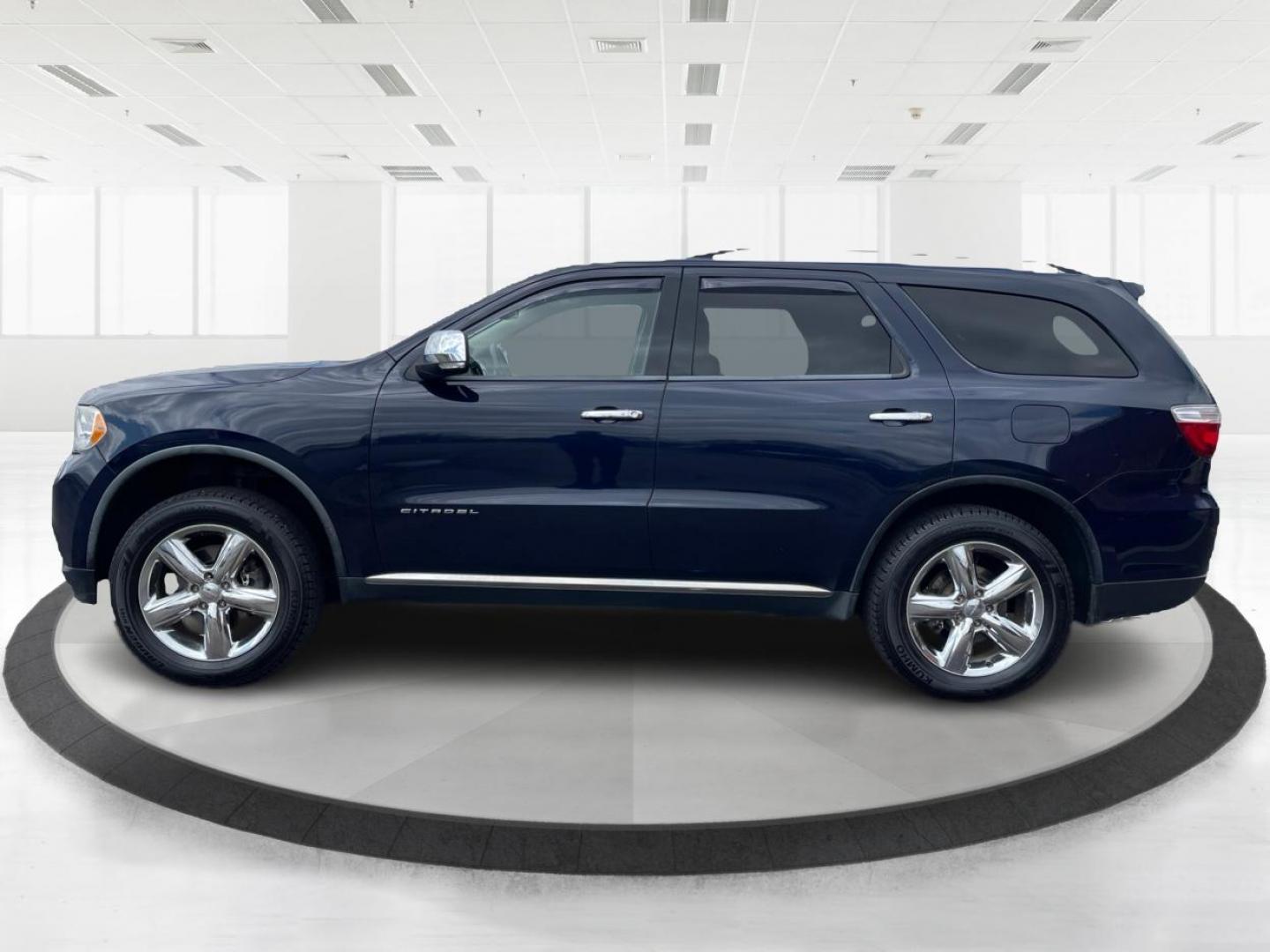 2012 Dodge Durango Citadel (1C4SDJET9CC) with an 3.6L V-6 DOHC engine, located at 8750 N County Rd 25A, Piqua, OH, 45356, (937) 908-9800, 40.164391, -84.232513 - Third Row - Photo#5