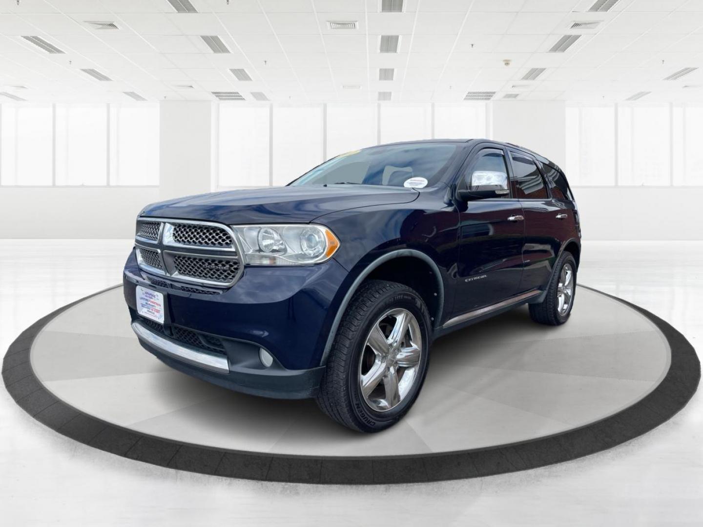 2012 Dodge Durango Citadel (1C4SDJET9CC) with an 3.6L V-6 DOHC engine, located at 8750 N County Rd 25A, Piqua, OH, 45356, (937) 908-9800, 40.164391, -84.232513 - Third Row - Photo#7