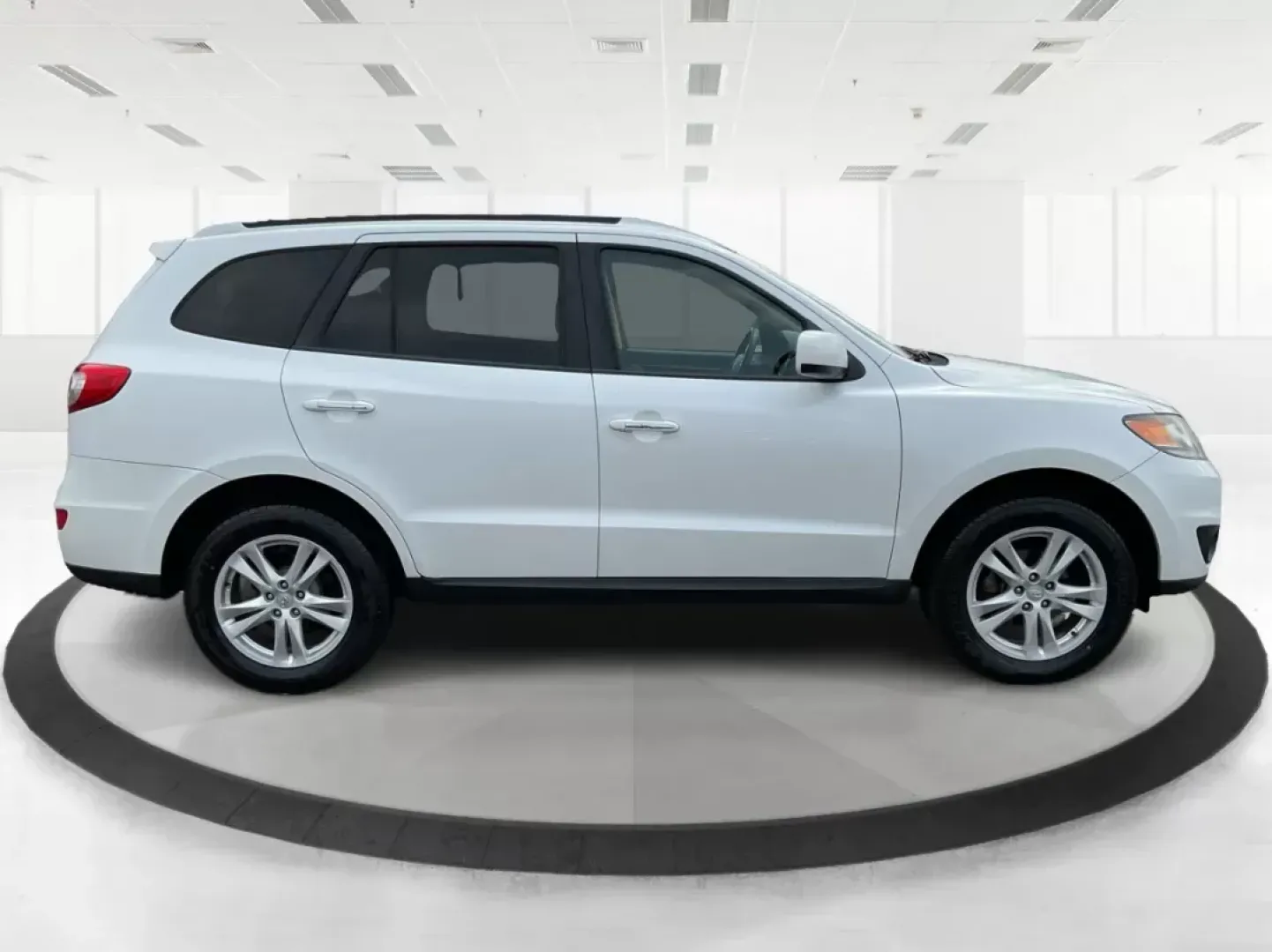 2012 Hyundai Santa Fe Limited V6 (5XYZKDAG5CG) with an 3.5L V-6 DOHC engine, located at 1230 East Main St, Xenia, OH, 45385, (937) 908-9800, 39.688026, -83.910172 - 2012 Hyundai Santa Fe Limited V6 - Photo#0