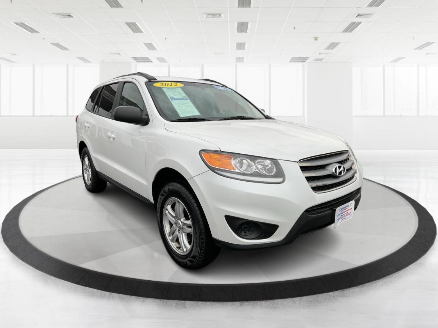 2012 Hyundai Santa Fe GLS (5XYZGDAB5CG) with an 2.4L I-4 DOHC engine, located at 1099 N County Rd 25A , Troy, OH, 45373, (937) 908-9800, 40.057079, -84.212883 - One Owner - Photo#0