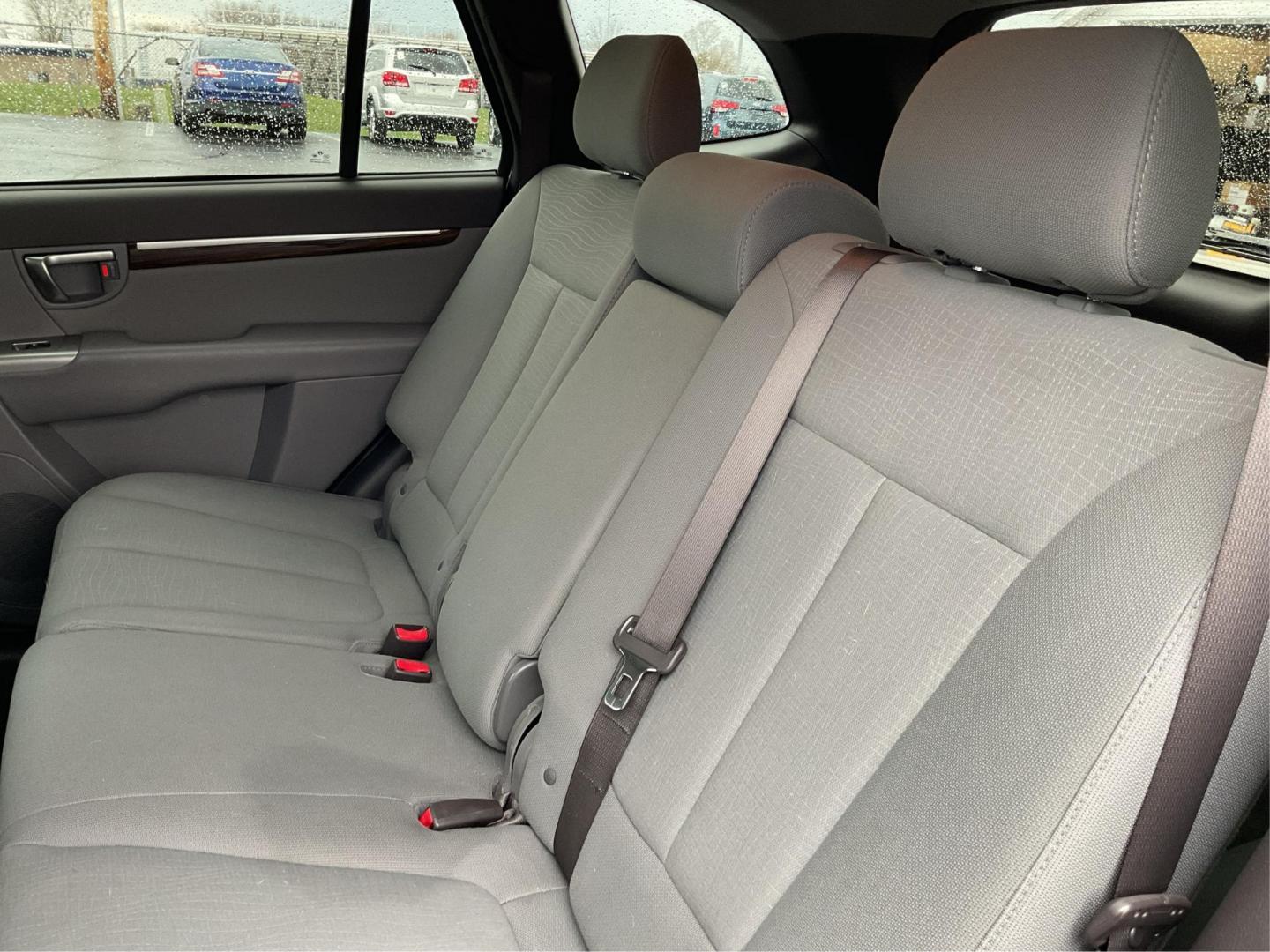2012 Hyundai Santa Fe GLS (5XYZGDAB5CG) with an 2.4L I-4 DOHC engine, located at 1099 N County Rd 25A , Troy, OH, 45373, (937) 908-9800, 40.057079, -84.212883 - One Owner - Photo#9