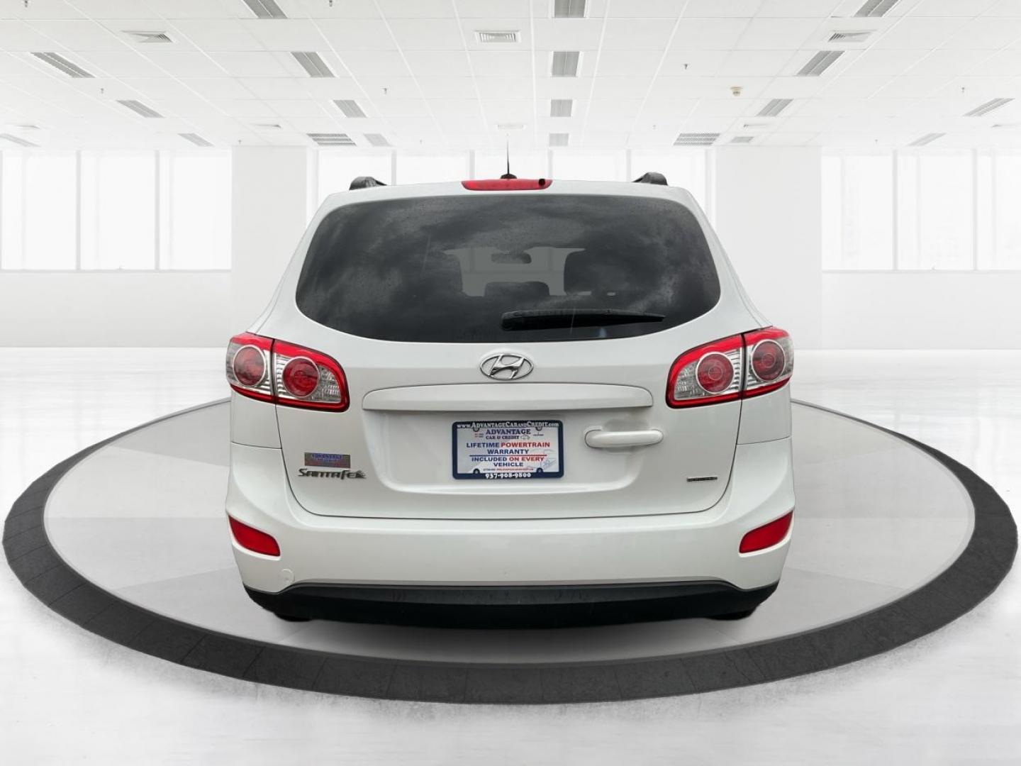 2012 Hyundai Santa Fe GLS (5XYZGDAB5CG) with an 2.4L I-4 DOHC engine, located at 1099 N County Rd 25A , Troy, OH, 45373, (937) 908-9800, 40.057079, -84.212883 - One Owner - Photo#3