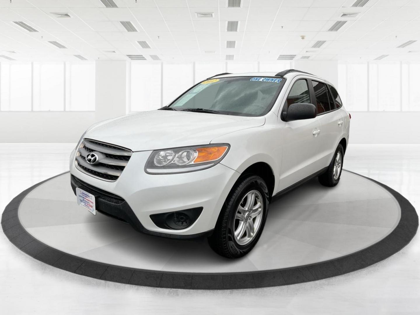 2012 Hyundai Santa Fe GLS (5XYZGDAB5CG) with an 2.4L I-4 DOHC engine, located at 1099 N County Rd 25A , Troy, OH, 45373, (937) 908-9800, 40.057079, -84.212883 - One Owner - Photo#7