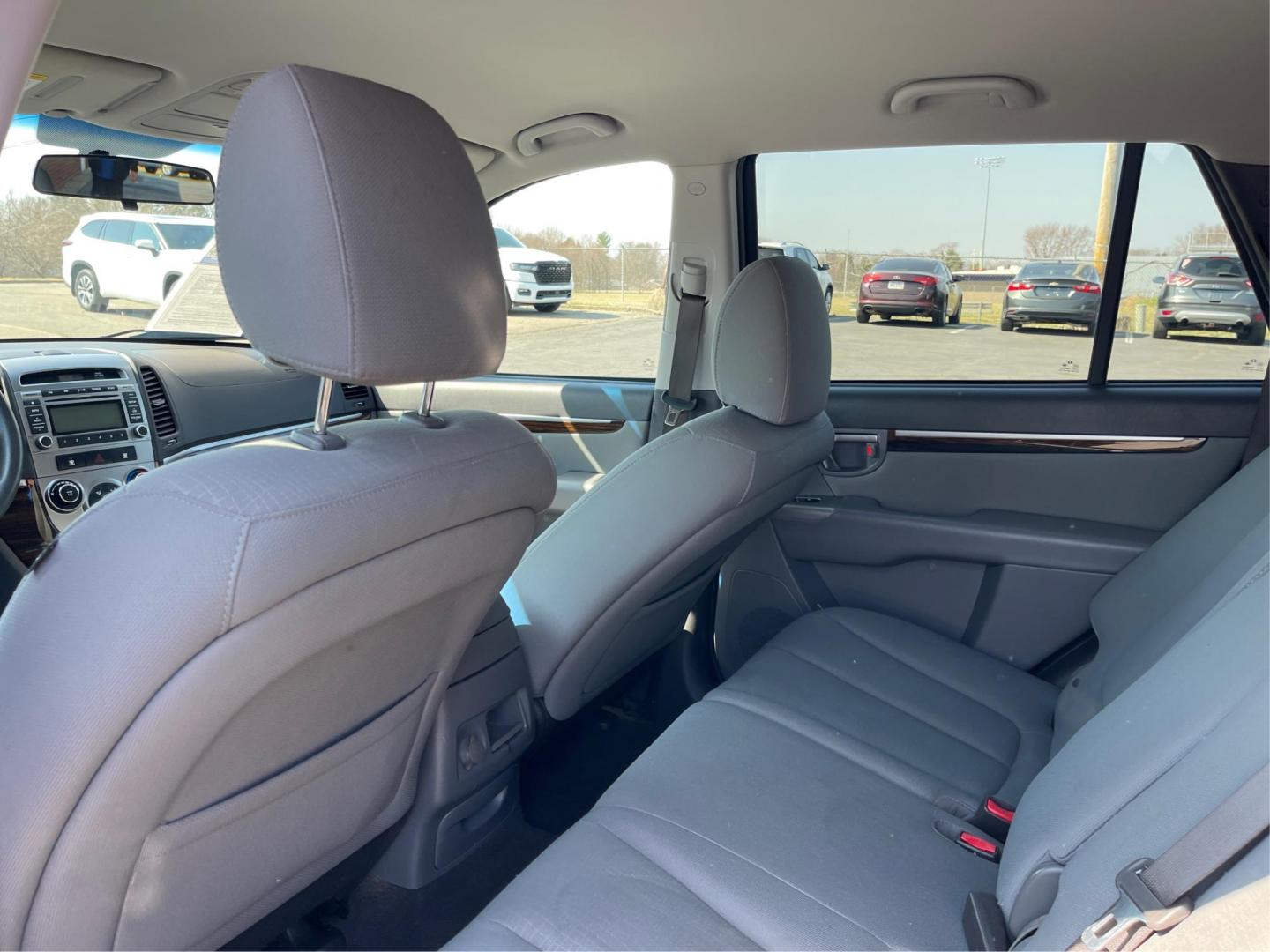 2012 Hyundai Santa Fe GLS (5XYZG3ABXCG) with an 2.4L I-4 DOHC engine, located at 401 Woodman Dr, Riverside, OH, 45431, (937) 908-9800, 39.760899, -84.123421 - 2012 Hyundai Santa Fe GLS - Photo#9