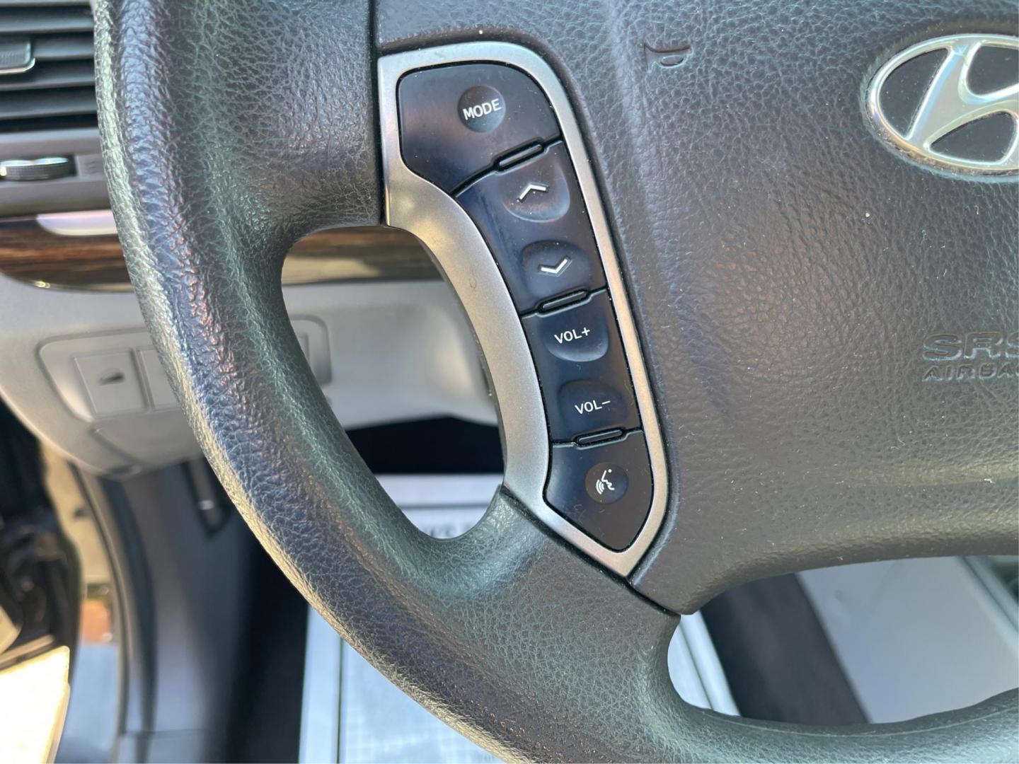 2012 Hyundai Santa Fe GLS (5XYZG3ABXCG) with an 2.4L I-4 DOHC engine, located at 401 Woodman Dr, Riverside, OH, 45431, (937) 908-9800, 39.760899, -84.123421 - 2012 Hyundai Santa Fe GLS - Photo#14
