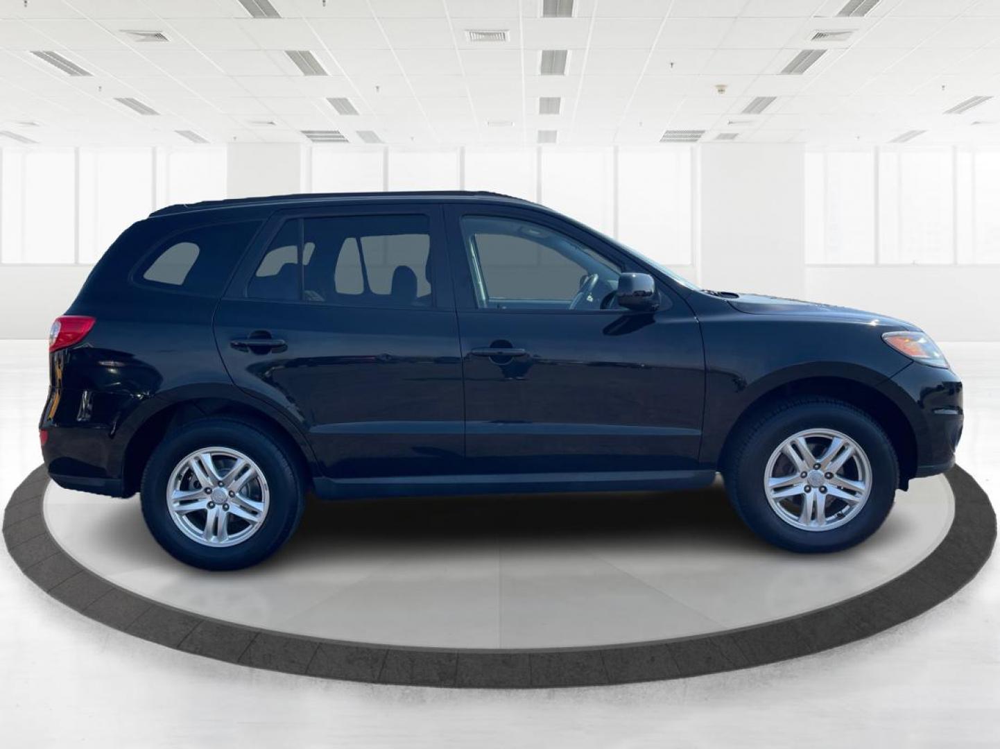 2012 Hyundai Santa Fe GLS (5XYZG3ABXCG) with an 2.4L I-4 DOHC engine, located at 401 Woodman Dr, Riverside, OH, 45431, (937) 908-9800, 39.760899, -84.123421 - 2012 Hyundai Santa Fe GLS - Photo#1
