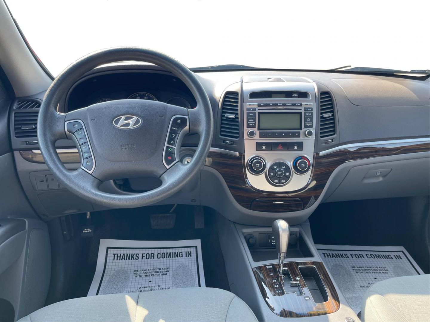 2012 Hyundai Santa Fe GLS (5XYZG3ABXCG) with an 2.4L I-4 DOHC engine, located at 401 Woodman Dr, Riverside, OH, 45431, (937) 908-9800, 39.760899, -84.123421 - 2012 Hyundai Santa Fe GLS - Photo#19