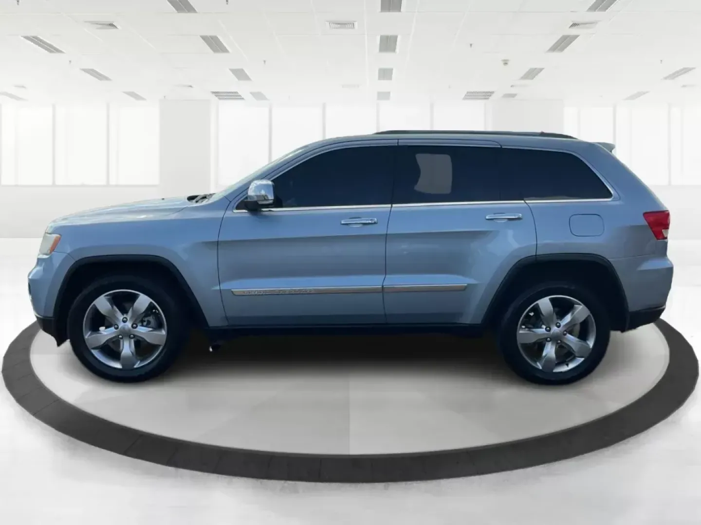 2012 Jeep Grand Cherokee Limited (1C4RJEBG5CC) with an Other engine, located at 880 E. National Road, Vandalia, OH, 45377, (937) 908-9800, 39.891918, -84.183594 - 2012 Jeep Grand Cherokee Limited - Photo#5
