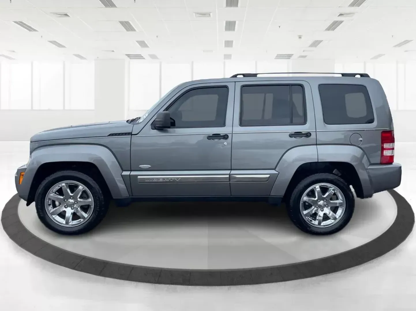 2012 Jeep Liberty Sport 4WD (1C4PJMAK8CW) with an 3.7L V6 SOHC 12V engine, 4-Speed Automatic transmission, located at 1099 N County Rd 25A , Troy, OH, 45373, (937) 908-9800, 40.057079, -84.212883 - 2012 Jeep Liberty Sport 4WD - Photo#5
