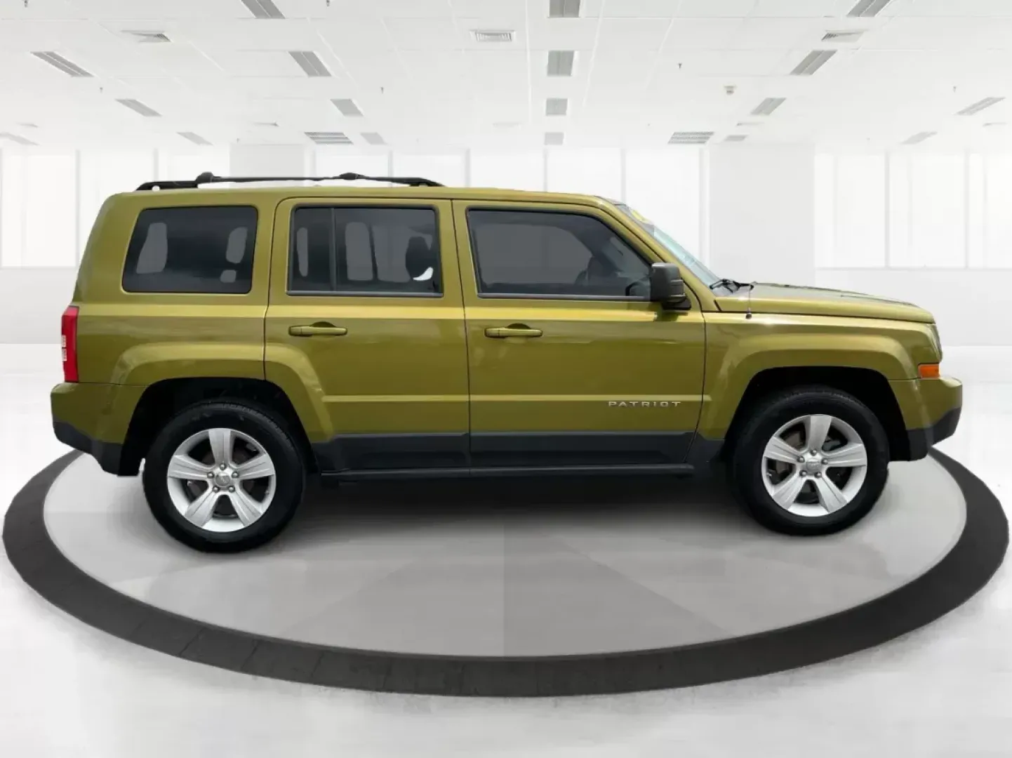 2012 Jeep Patriot Latitude 2WD (1C4NJPFA7CD) with an 2.0L L4 DOHC 16V engine, located at 401 Woodman Dr, Riverside, OH, 45431, (937) 908-9800, 39.760899, -84.123421 - 2012 Jeep Patriot Latitude 2WD - Photo#0
