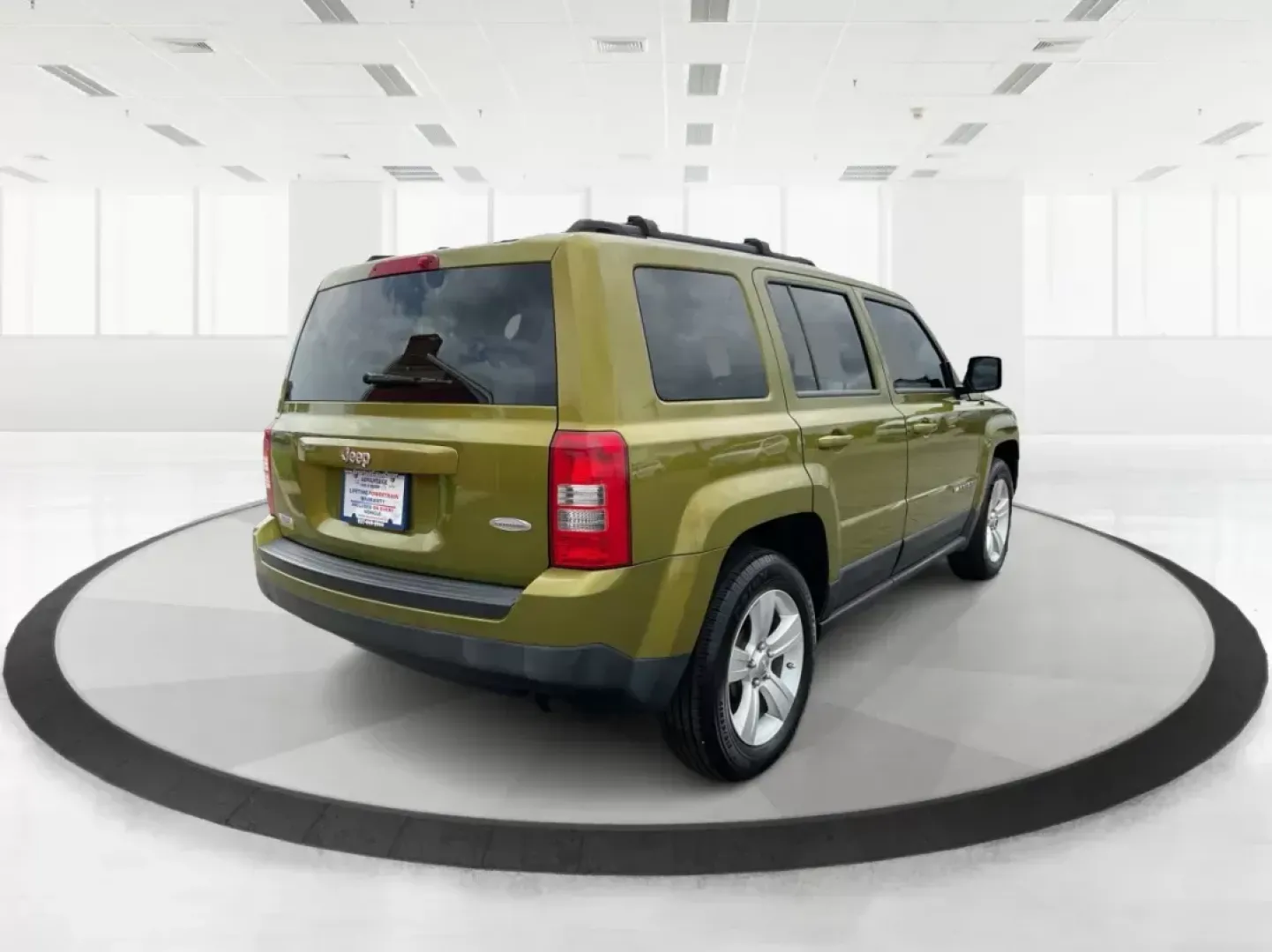 2012 Jeep Patriot Latitude 2WD (1C4NJPFA7CD) with an 2.0L L4 DOHC 16V engine, located at 401 Woodman Dr, Riverside, OH, 45431, (937) 908-9800, 39.760899, -84.123421 - 2012 Jeep Patriot Latitude 2WD - Photo#1