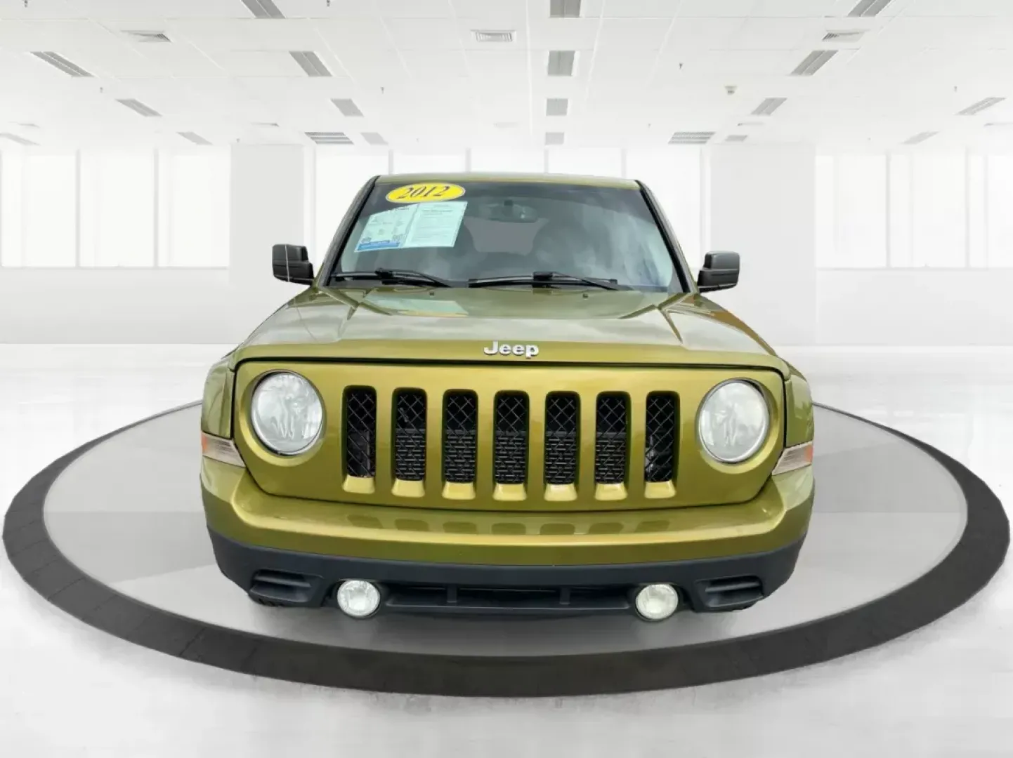 2012 Jeep Patriot Latitude 2WD (1C4NJPFA7CD) with an 2.0L L4 DOHC 16V engine, located at 401 Woodman Dr, Riverside, OH, 45431, (937) 908-9800, 39.760899, -84.123421 - 2012 Jeep Patriot Latitude 2WD - Photo#6
