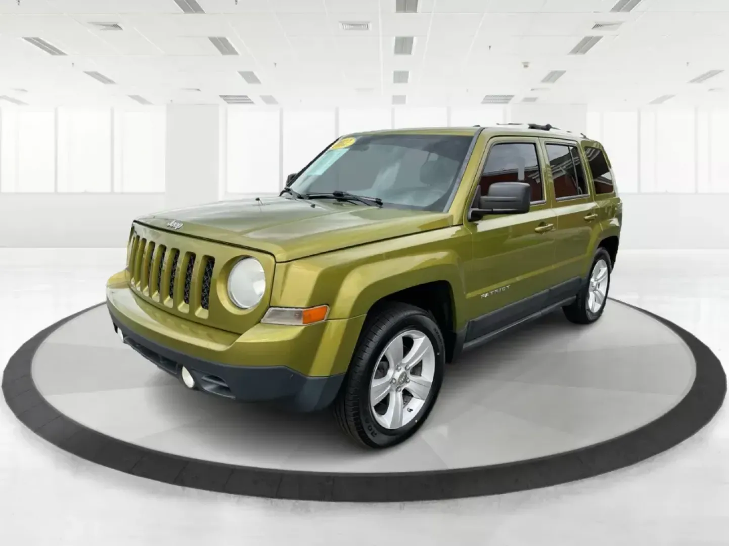 2012 Jeep Patriot Latitude 2WD (1C4NJPFA7CD) with an 2.0L L4 DOHC 16V engine, located at 401 Woodman Dr, Riverside, OH, 45431, (937) 908-9800, 39.760899, -84.123421 - 2012 Jeep Patriot Latitude 2WD - Photo#7