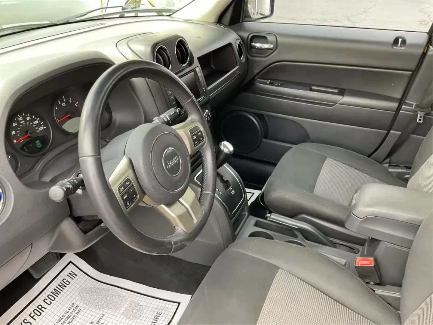 2012 Jeep Patriot Latitude 2WD (1C4NJPFA7CD) with an 2.0L L4 DOHC 16V engine, located at 401 Woodman Dr, Riverside, OH, 45431, (937) 908-9800, 39.760899, -84.123421 - 2012 Jeep Patriot Latitude 2WD - Photo#8