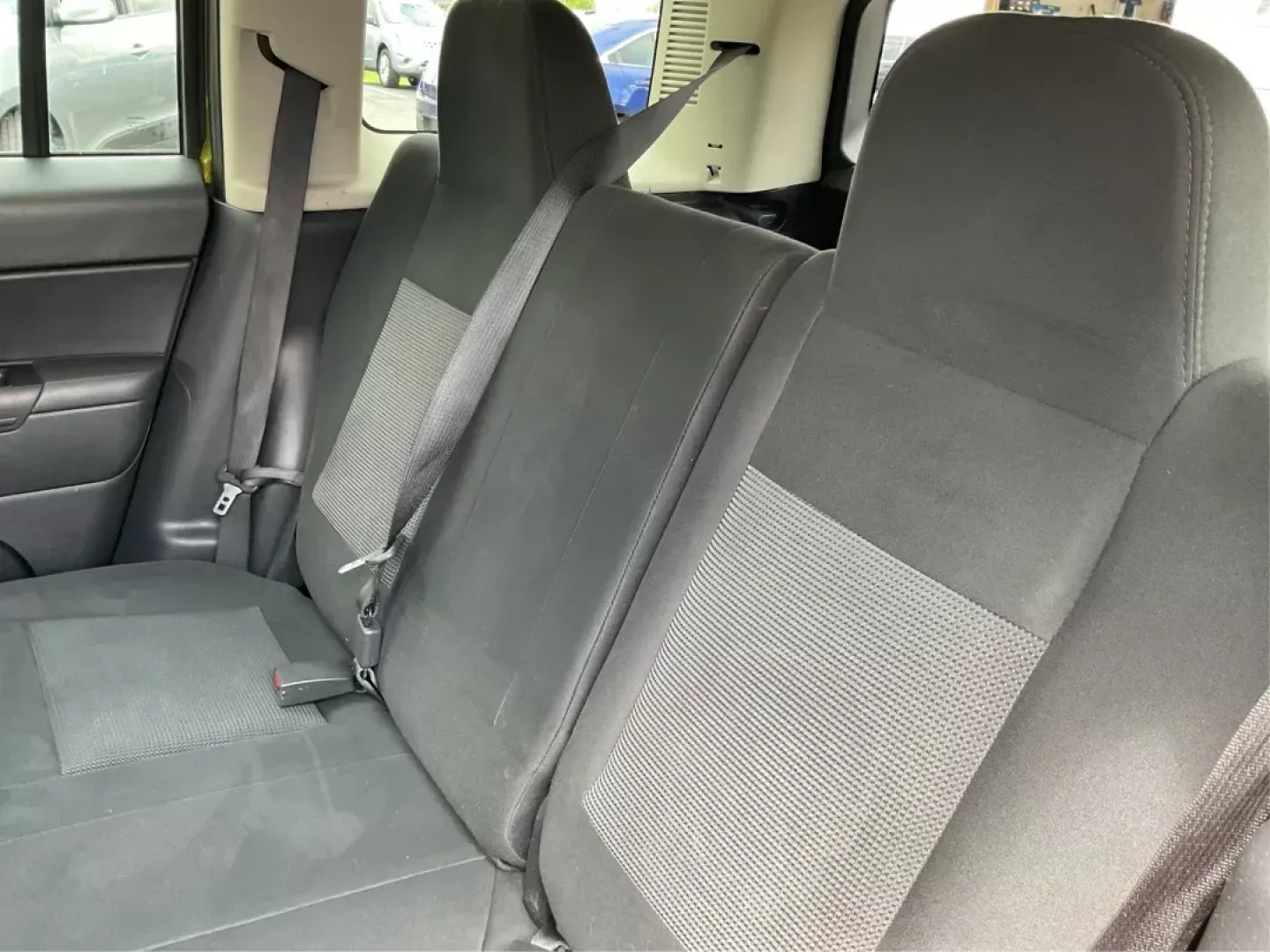 2012 Jeep Patriot Latitude 2WD (1C4NJPFA7CD) with an 2.0L L4 DOHC 16V engine, located at 401 Woodman Dr, Riverside, OH, 45431, (937) 908-9800, 39.760899, -84.123421 - 2012 Jeep Patriot Latitude 2WD - Photo#9