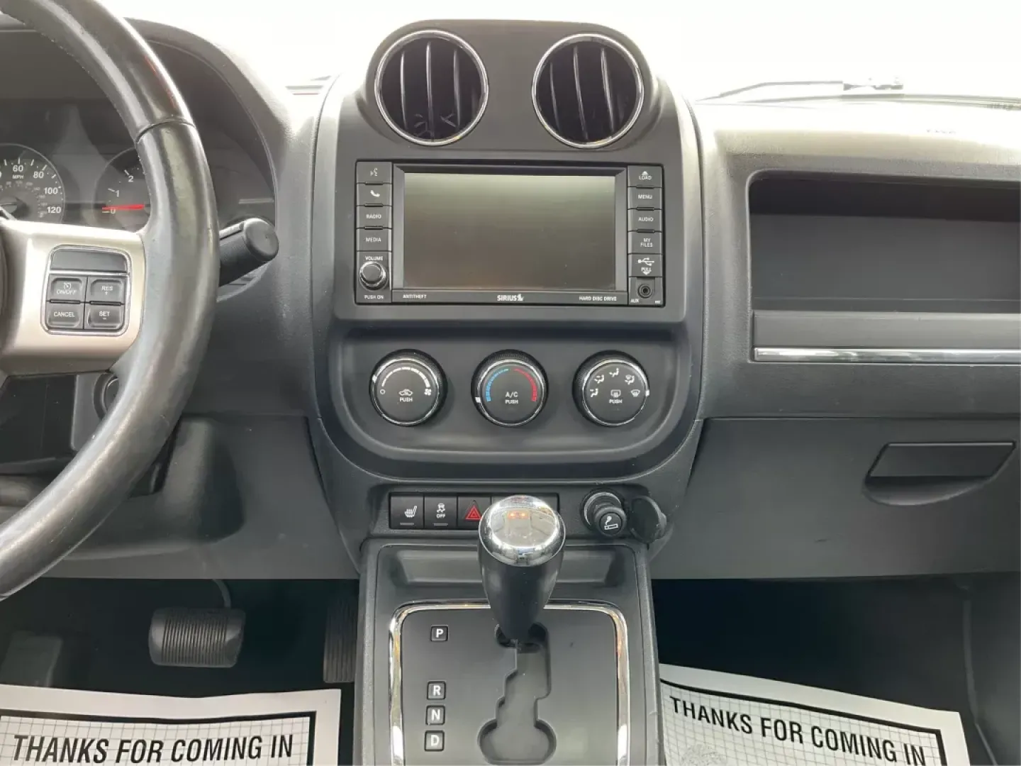 2012 Jeep Patriot Latitude 2WD (1C4NJPFA7CD) with an 2.0L L4 DOHC 16V engine, located at 401 Woodman Dr, Riverside, OH, 45431, (937) 908-9800, 39.760899, -84.123421 - 2012 Jeep Patriot Latitude 2WD - Photo#12