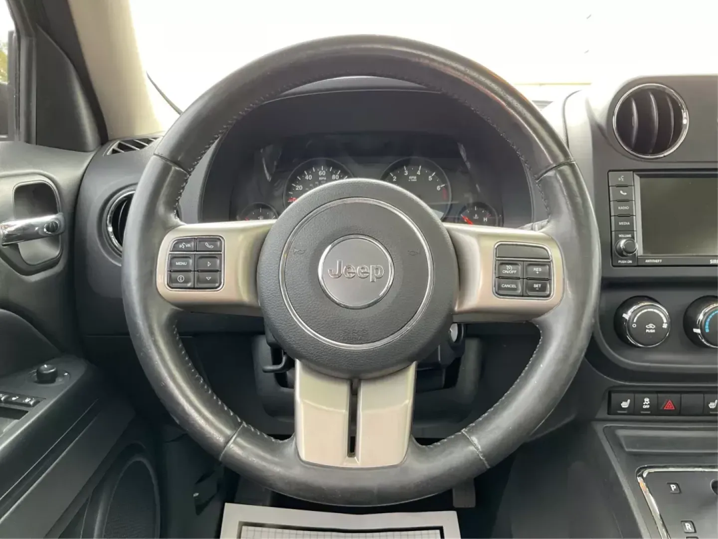 2012 Jeep Patriot Latitude 2WD (1C4NJPFA7CD) with an 2.0L L4 DOHC 16V engine, located at 401 Woodman Dr, Riverside, OH, 45431, (937) 908-9800, 39.760899, -84.123421 - 2012 Jeep Patriot Latitude 2WD - Photo#15