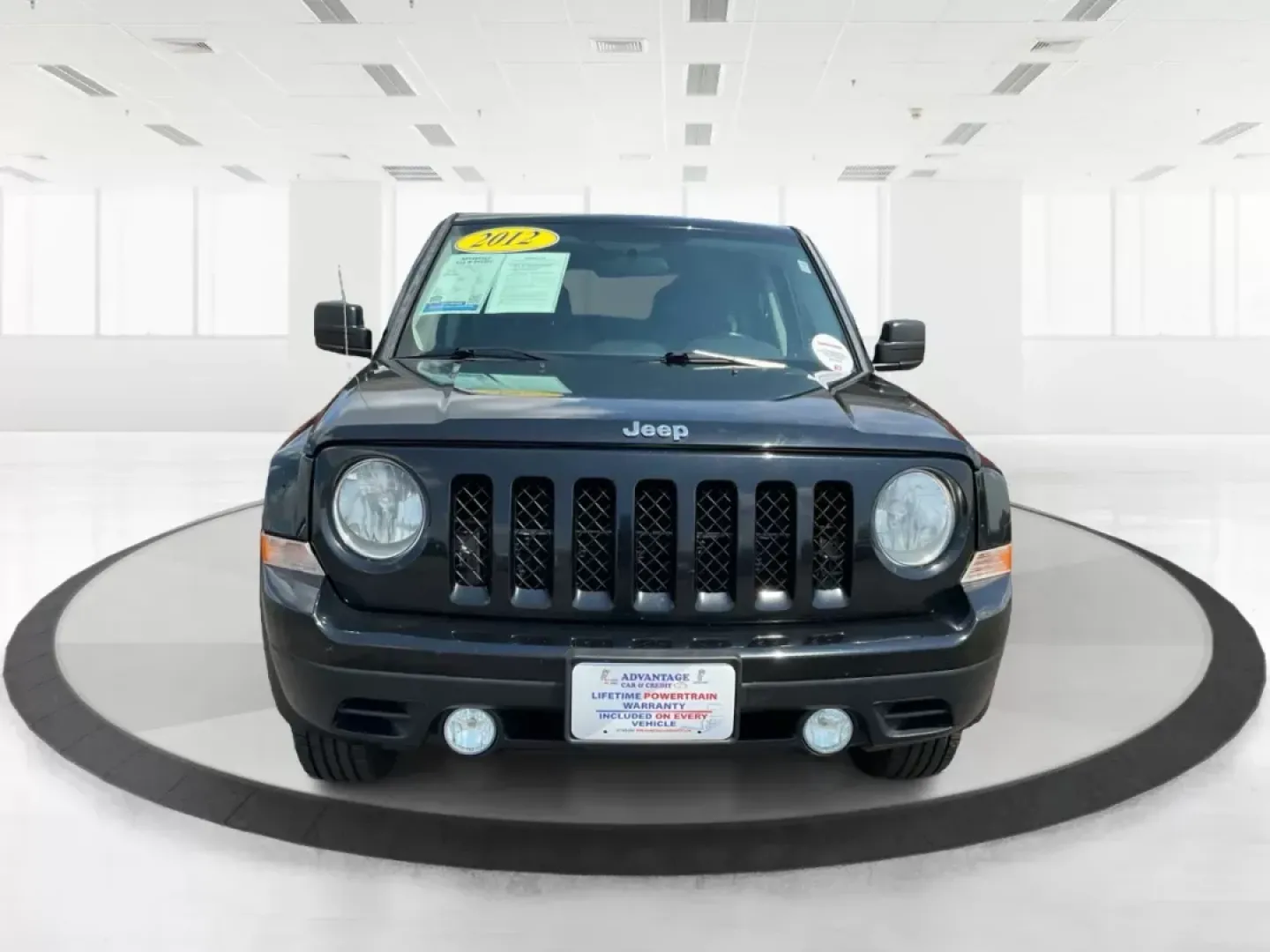 2012 Jeep Patriot Latitude (1C4NJRFB1CD) with an 2.4L I-4 DOHC engine, located at 1951 S Dayton Lakeview Rd., New Carlisle, OH, 45344, (937) 908-9800, 39.890999, -84.050255 - 2012 Jeep Patriot Latitude - Photo#6