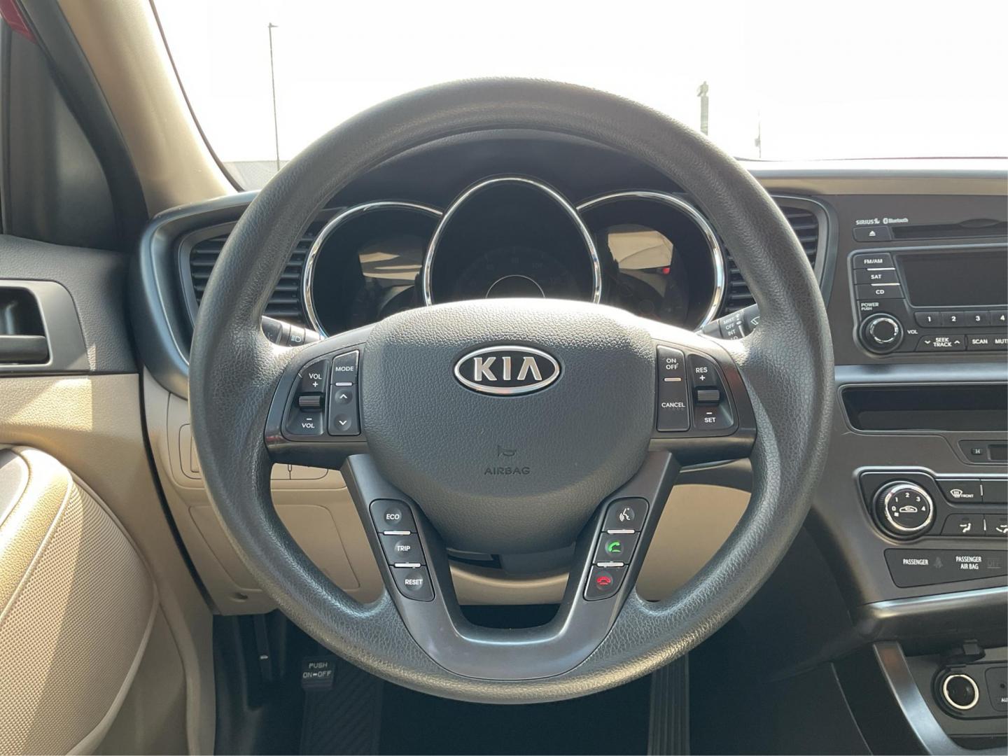 2012 Spicy Red Metallic Kia Optima LX AT (5XXGM4A73CG) with an 2.4L L4 DOHC 16V engine, 6-Speed Automatic transmission, located at 1099 N County Rd 25A , Troy, OH, 45373, (937) 908-9800, 40.057079, -84.212883 - 2012 Kia Optima LX AT - Photo#15