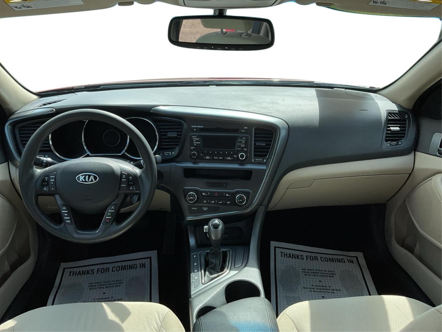 2012 Spicy Red Metallic Kia Optima LX AT (5XXGM4A73CG) with an 2.4L L4 DOHC 16V engine, 6-Speed Automatic transmission, located at 1099 N County Rd 25A , Troy, OH, 45373, (937) 908-9800, 40.057079, -84.212883 - 2012 Kia Optima LX AT - Photo#19