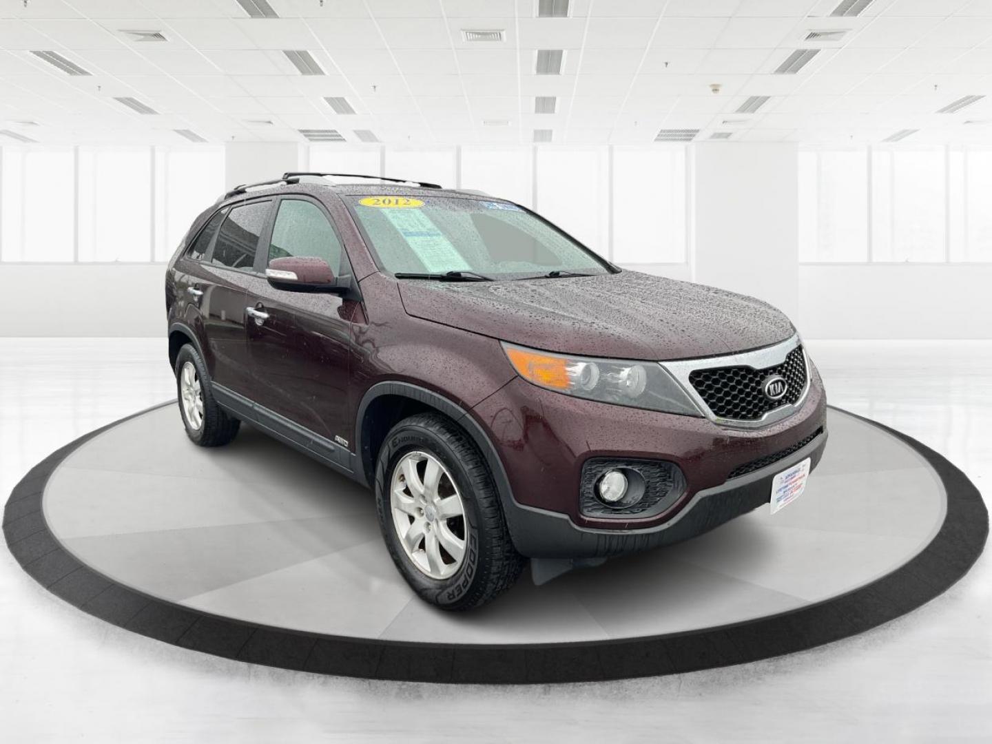 2012 Kia Sorento LX (5XYKTDA6XCG) with an 2.4L I-4 gasoline direct injection engine, located at 880 E. National Road, Vandalia, OH, 45377, (937) 908-9800, 39.891918, -84.183594 - One Owner - Photo#0